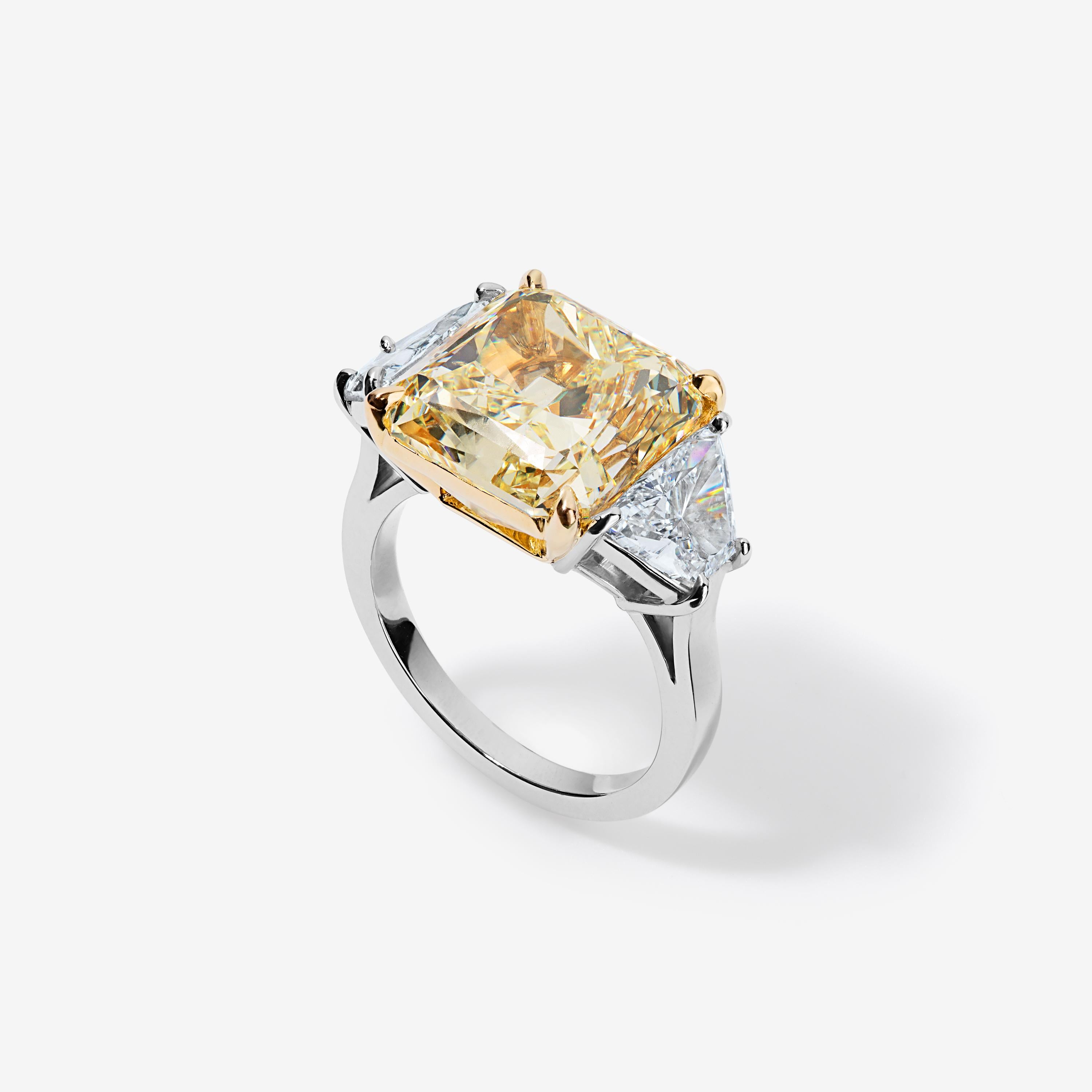 Contemporary GIA Certified 10.05 Carat Fancy Yellow Diamond Three Stone Ring For Sale
