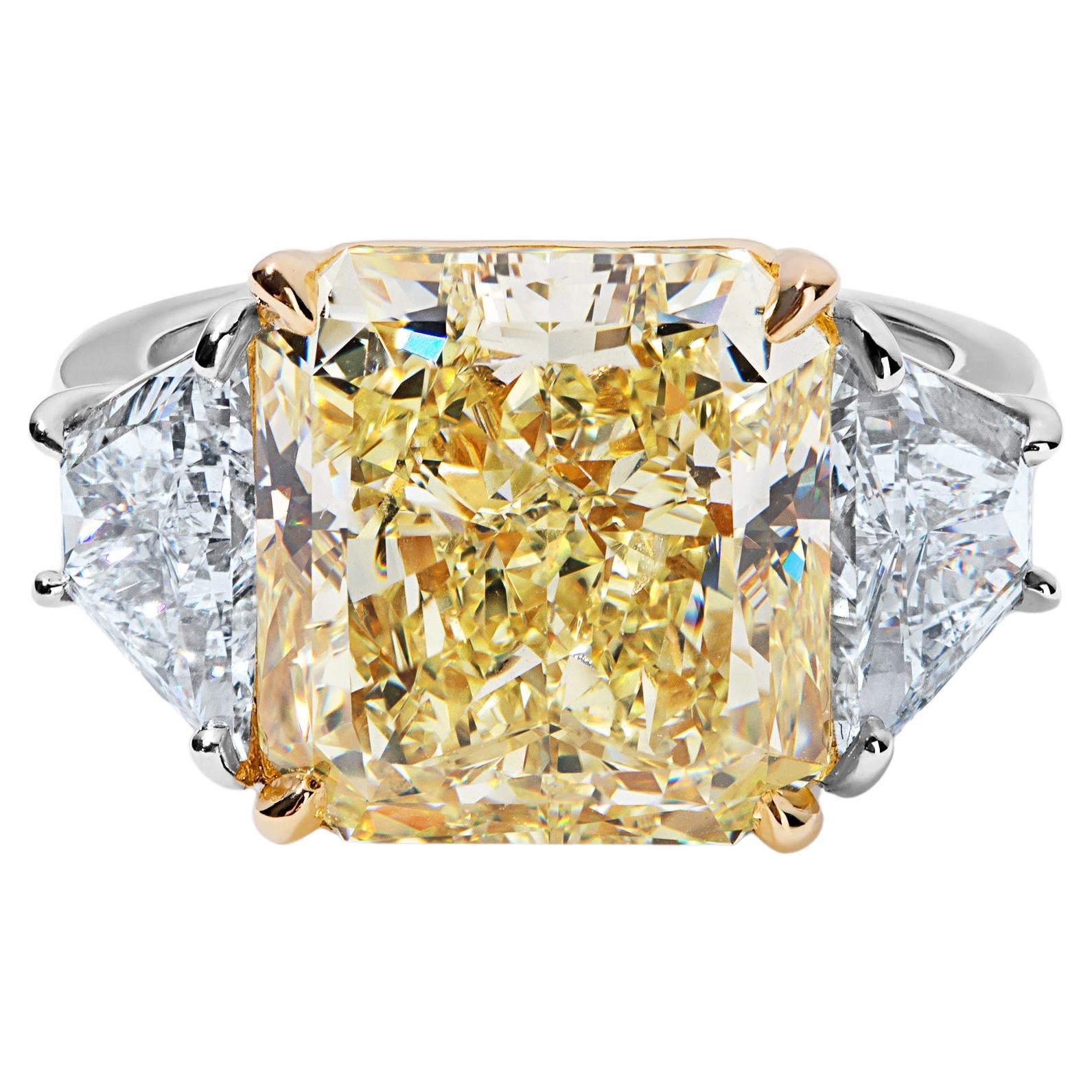 GIA Certified 10.05 Carat Fancy Yellow Diamond Three Stone Ring For Sale