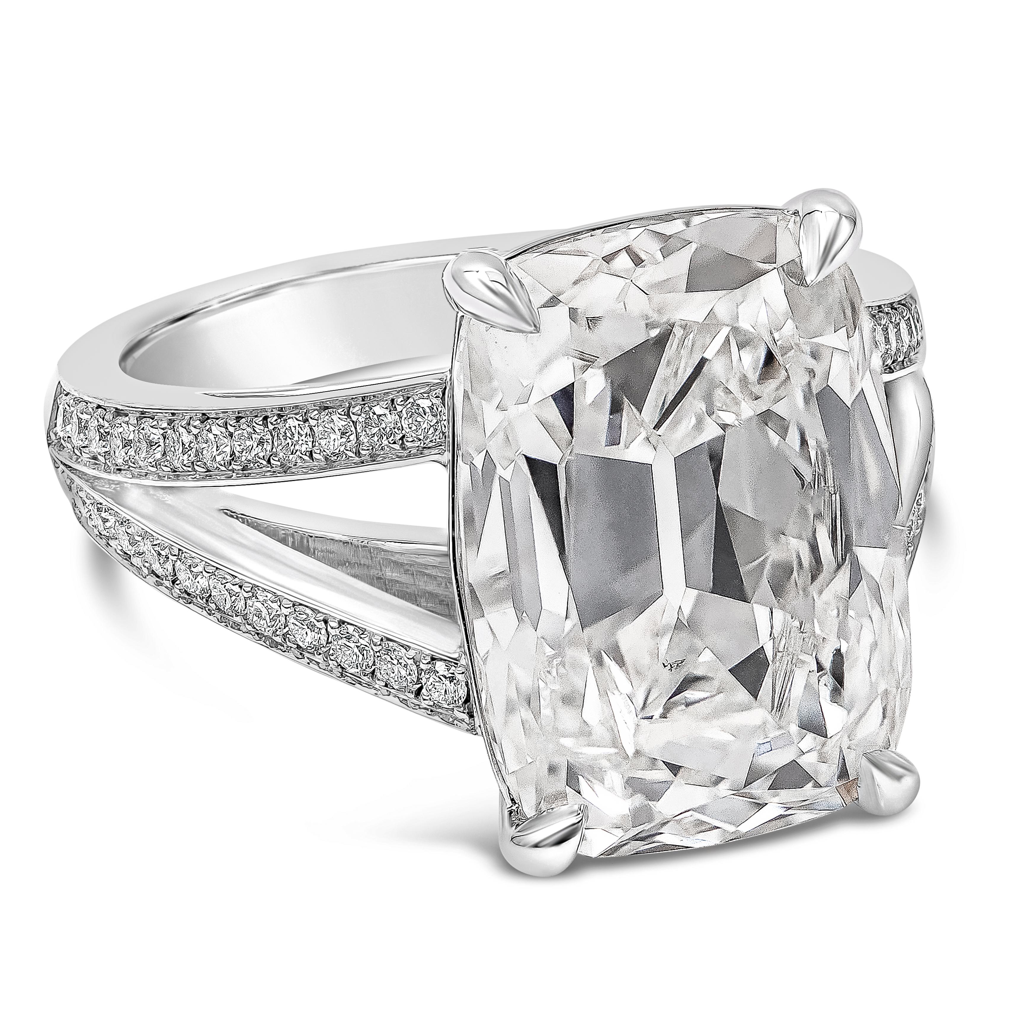 A beautiful engagement ring style showcasing a GIA Certified 10.09 carats elongated cushion cut diamond, I Color and SI1 in clarity. The center diamond is set in four prong and a handcrafted split-shank setting accented with round brilliant diamonds