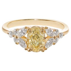Anello di fidanzamento con diamante giallo fantasia certificato GIA da 1,00ct in oro giallo 18 carati