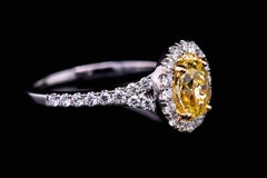 GIA Certified 1.00ct Fancy Yellow Oval Diamond Ring
