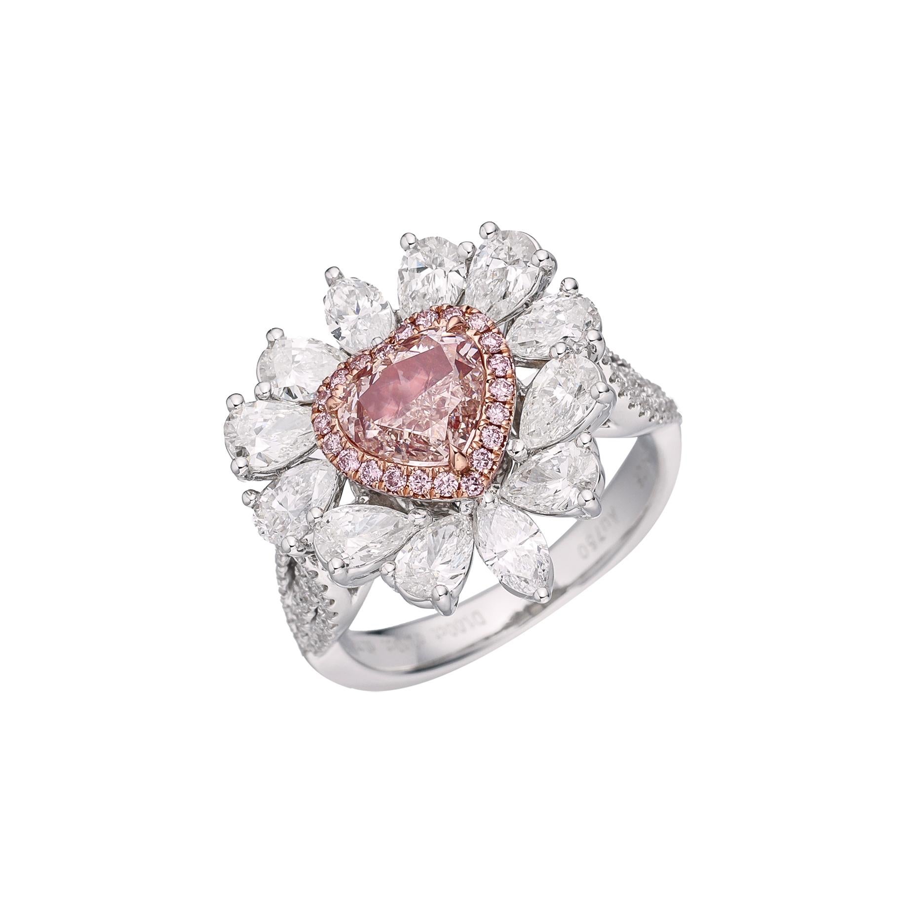 Introducing Elegance Personified: Discover the Exquisite GIA Certified 1.00ct Light Pinkish Brown Natural Heart Shape Diamond Solitaire Ring, a true masterpiece that captures the essence of beauty and sophistication. Crafted with precision and set
