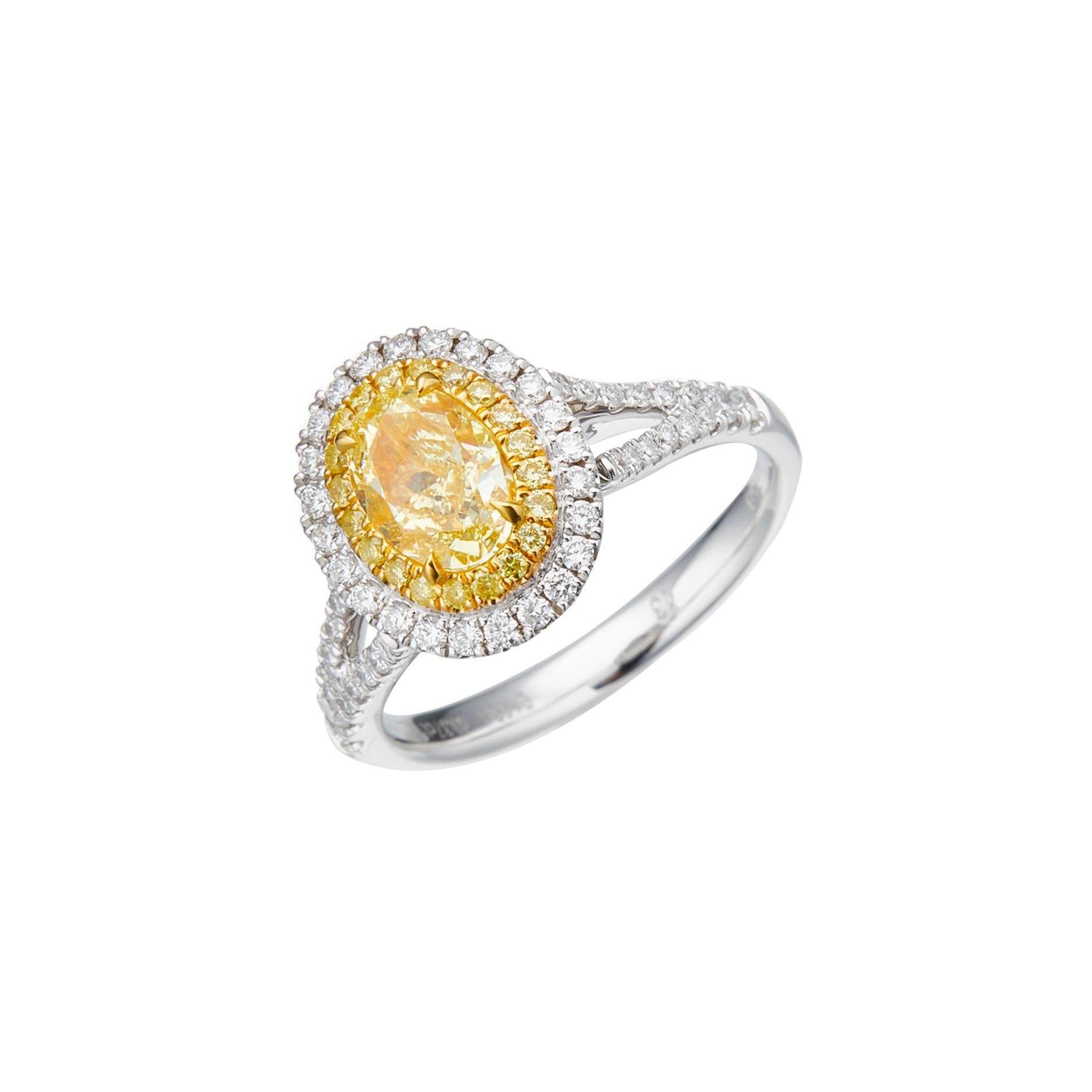 Discover the epitome of elegance and versatility with this breathtaking GIA Certified 1.00 carat Natural Fancy Yellow Cushion Cut Diamond Solitaire Ring, expertly crafted in luxurious 18kt gold. This exquisite piece is not only a statement of