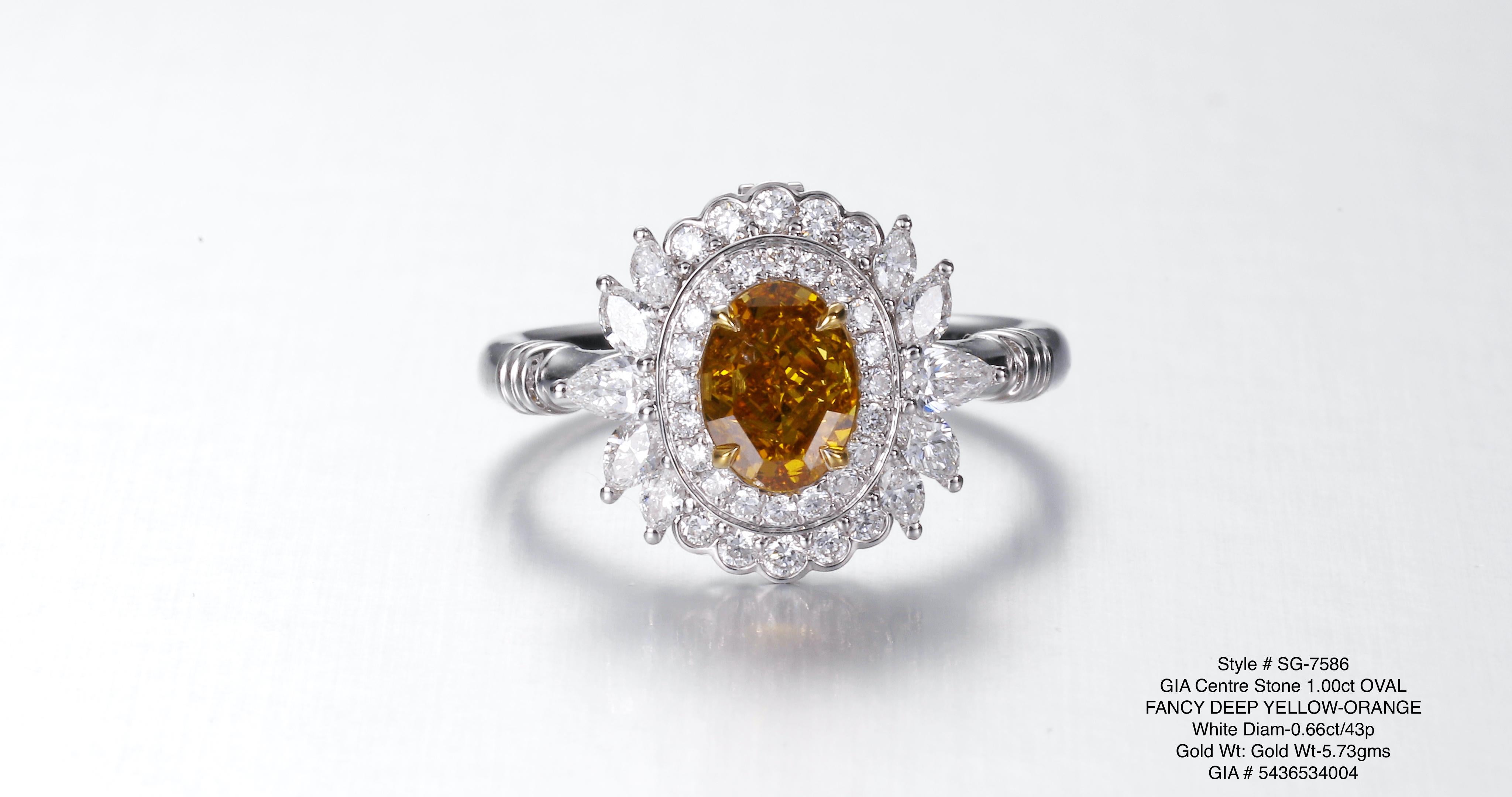 The focal point of this stunning ring is the remarkable 1.00ct GIA certified natural fancy deep yellow orange diamond, renowned for its intense and vibrant hues. Its warm and fiery tones exude a sense of energy and passion, making it a truly