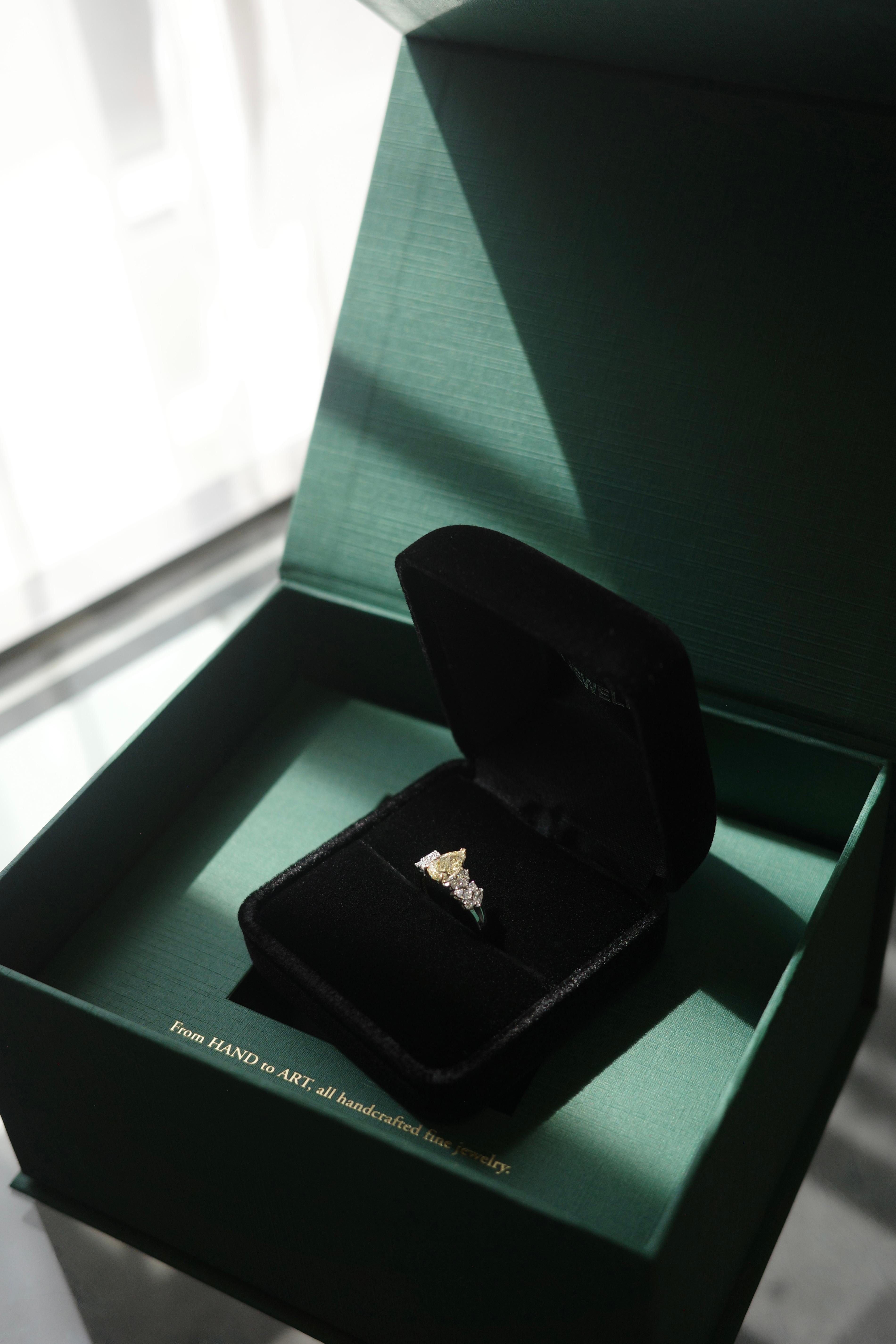 For Sale:  GIA Certified 1.00ct Natural Pear Cut Fancy Light Yellow Diamond White Gold Ring 5