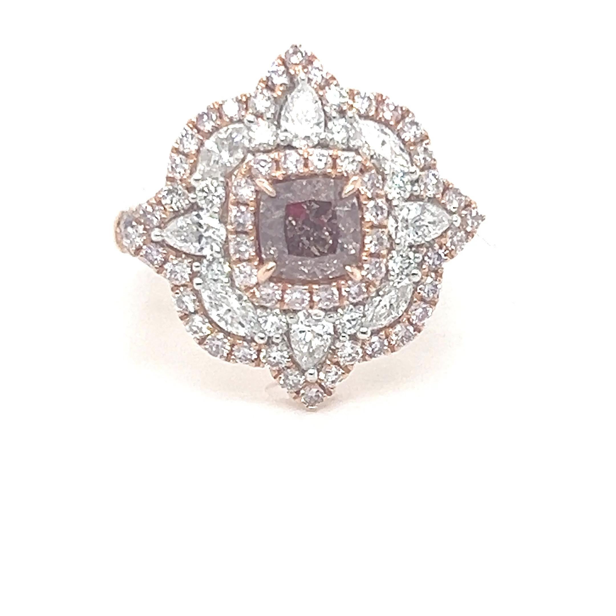 This GIA-certified 1.01 -carat cushion-cut, fancy brownish-pink, SI2 diamond ring is beautifully styled in a floral motif, offering a sophisticated and elegant look. The pink diamond, a highly sought-after color in the diamond world, is encircled by