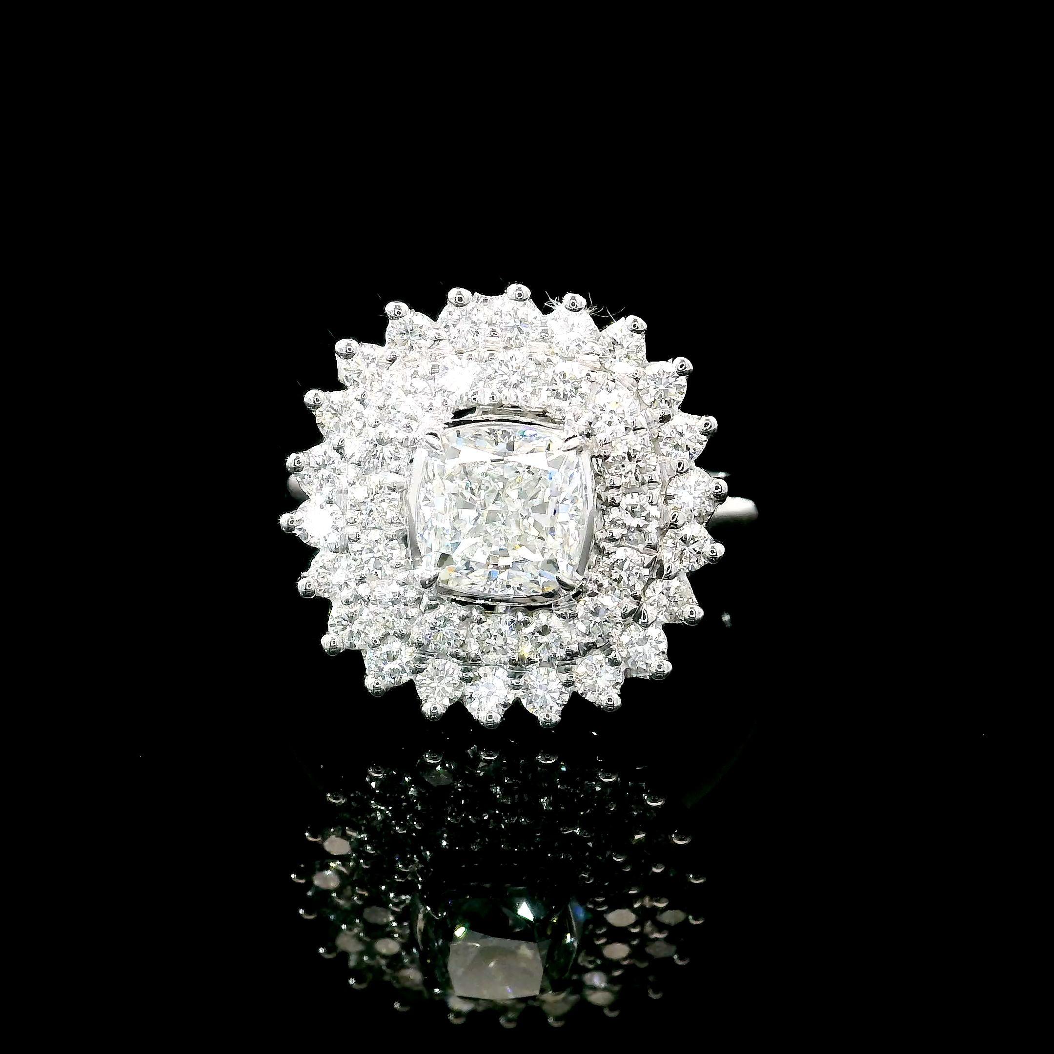 18kt white gold ring with diamonds
  
  Gold colour & karat: White gold 18kt
  Weight: 5.60 grams
  
  Set with-
  Stone type: Diamonds
  Shape: Cushion
  Carat: 1.01
  Colour: D Colour
  Clarity: VS1
  
  Surrounding Stones: Diamonds
 1) White
