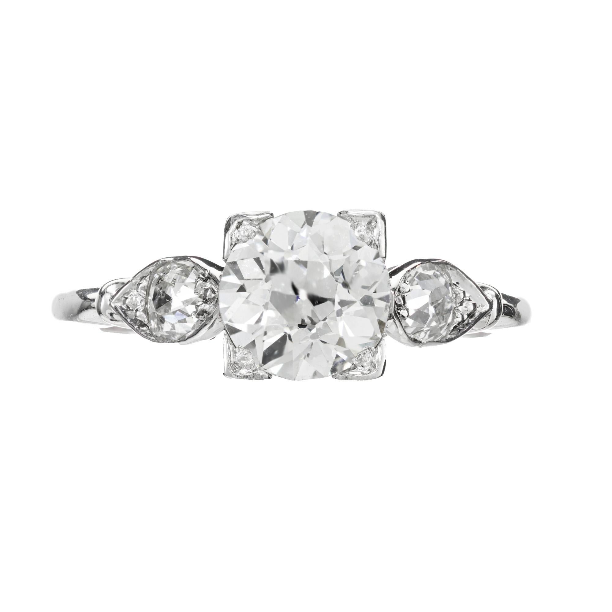 Original 1930's diamond engagement ring. GIA certified 1.01ct Old European cut diamond, in a platinum setting with two old mine accent diamonds. All three diamonds have great brilliance.

1 Old European cut diamond, H VS2 approx. 1.01cts GIA