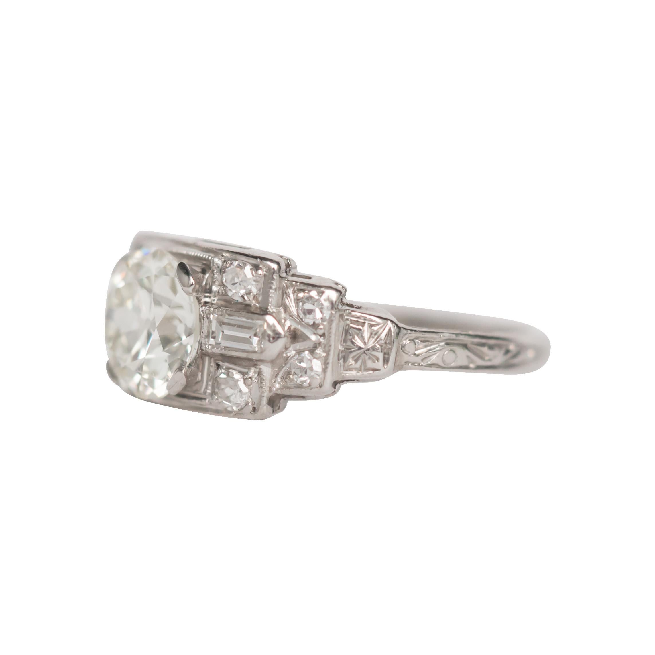 Item Details: 
Ring Size: 5.5
Metal Type: Platinum [Hallmarked, and Tested]
Weight: 3.1 grams

Center Diamond Details:
GIA REPORT # 2201682967
Weight: 1.01 carat
Cut: Old European Brilliant
Color: N
Clarity: VVS2

Side Diamond Details:
Weight: .25