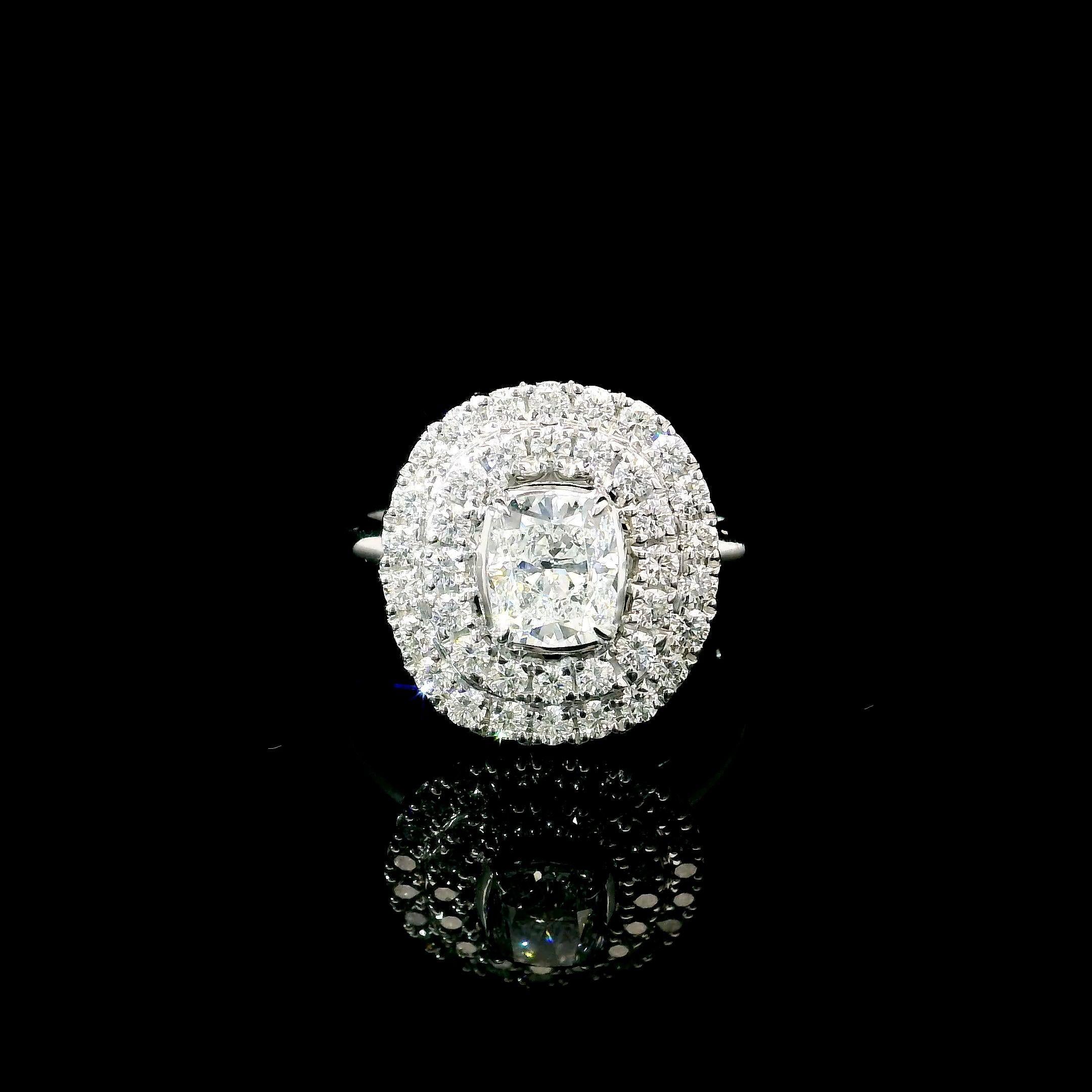 18kt white gold ring with diamonds
  
  Gold colour & karat: White gold 18kt
  Weight: 5.80 grams
  
  Set with-
  Stone type: Diamonds
  Shape: Cushion
  Carat: 1.01 ct
  Colour: E 
  Clarity: VS1
  
  Surrounding Stones: Diamonds
 1) White