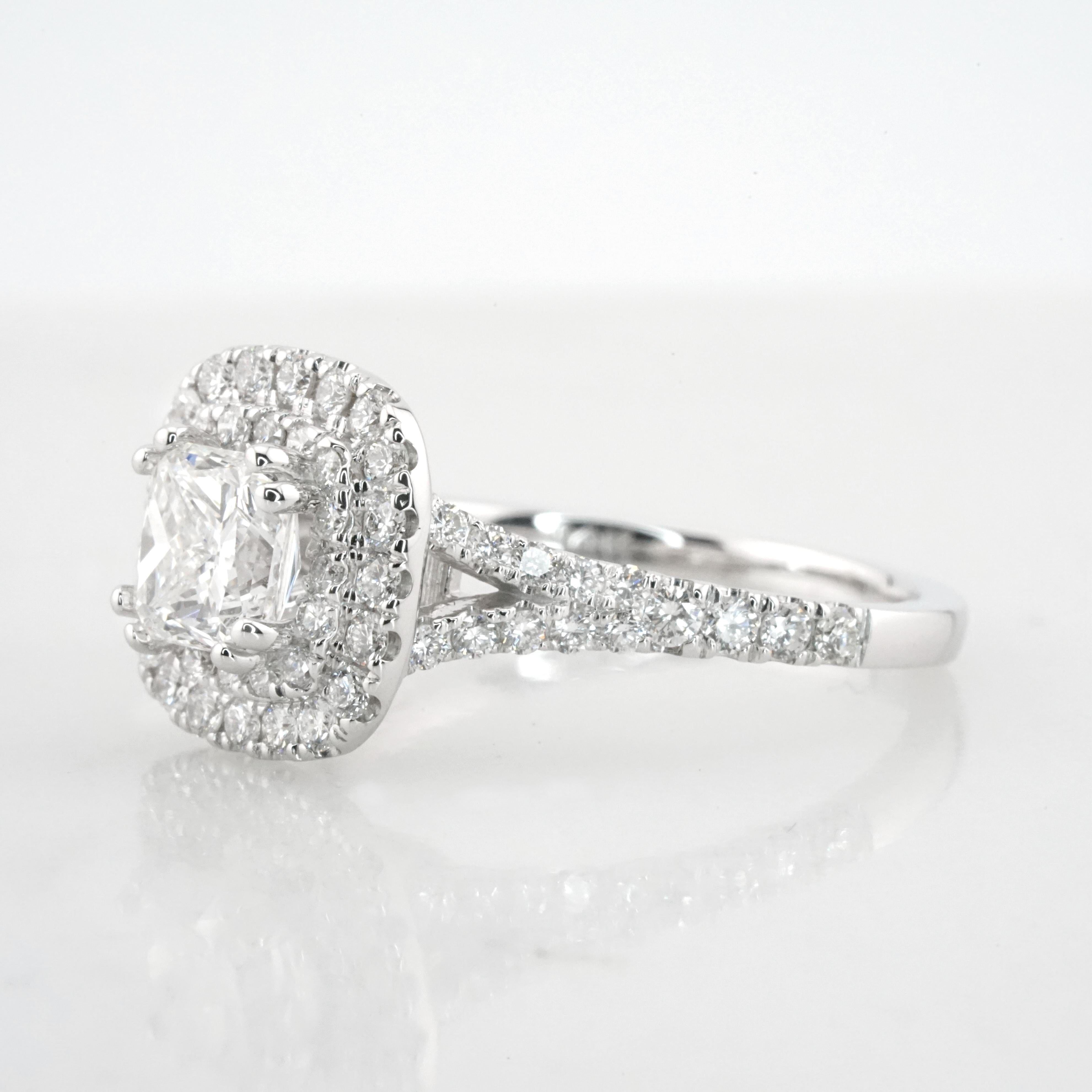 A Testament to Timeless Love: GIA Certified 1.01 Carat E VS2 Radiant Cut 14K White Gold Engagement Ring

This radiant cut engagement ring is a true testament to enduring elegance. The central gemstone is a GIA-certified 1.01 carat Radiant cut
