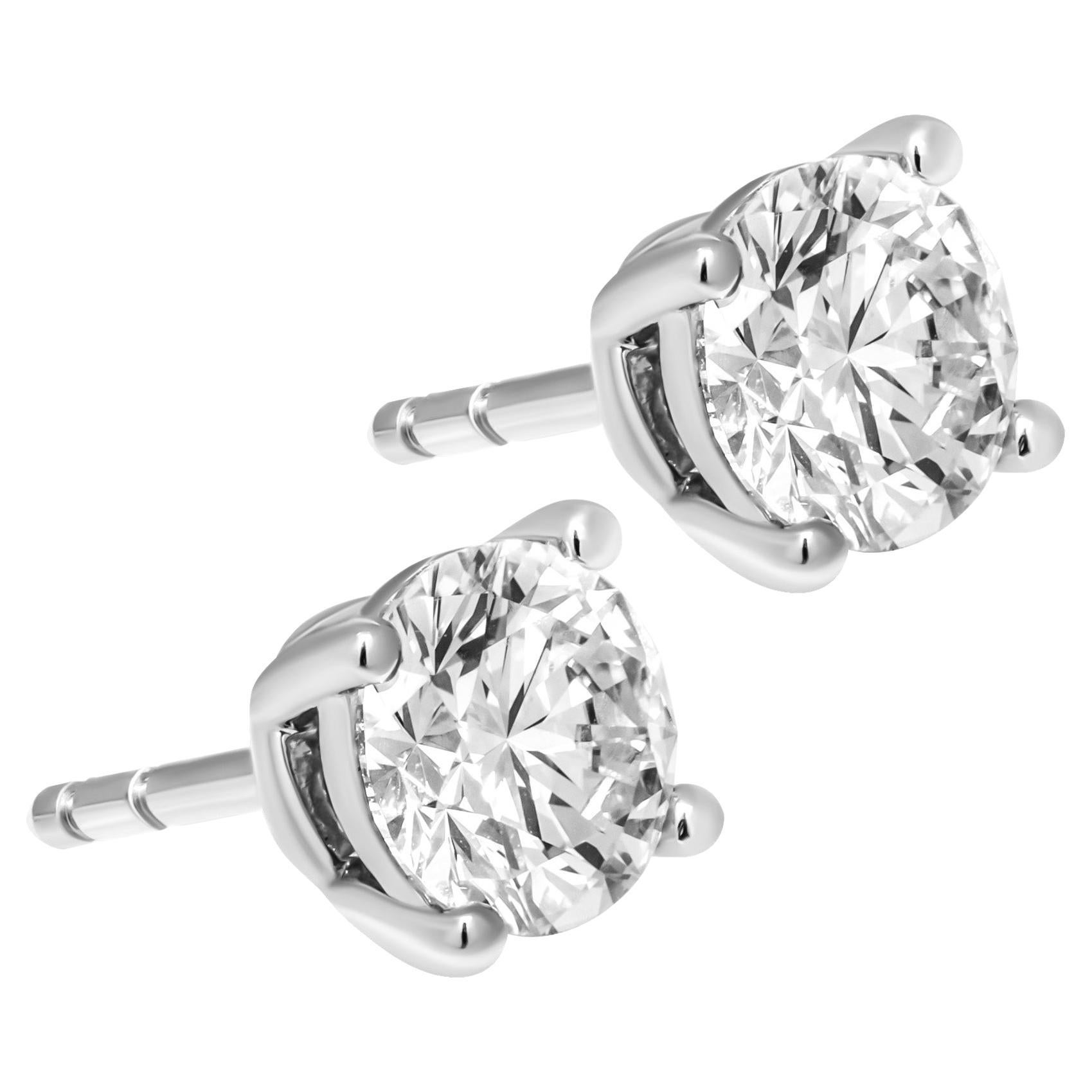 GIA Certified 1.01 carat each round shape 4 prongs studs in Platinum For Sale