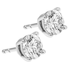 GIA Certified 1.01 carat each round shape 4 prongs studs in Platinum