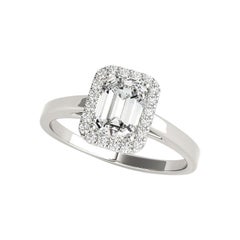 Bague en or blanc 18 carats certifiée GIA de 1,01 carat d'émeraude en halo