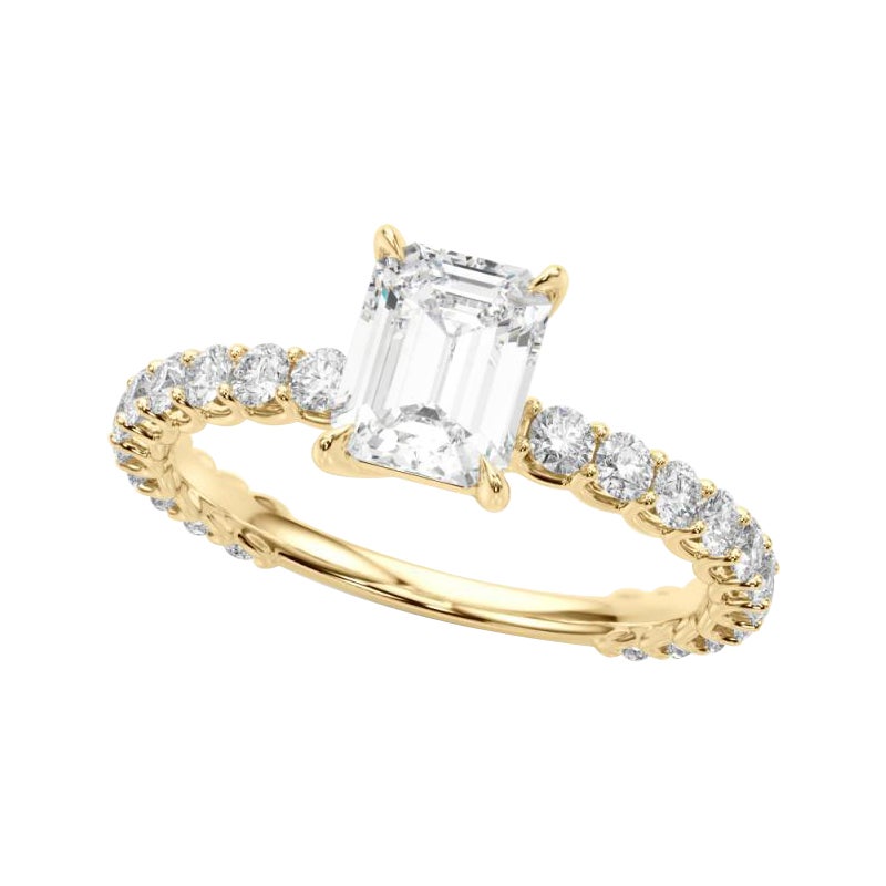 Smeraldo certificato GIA da 1.01 carati con anello di diamanti a eternità parziale