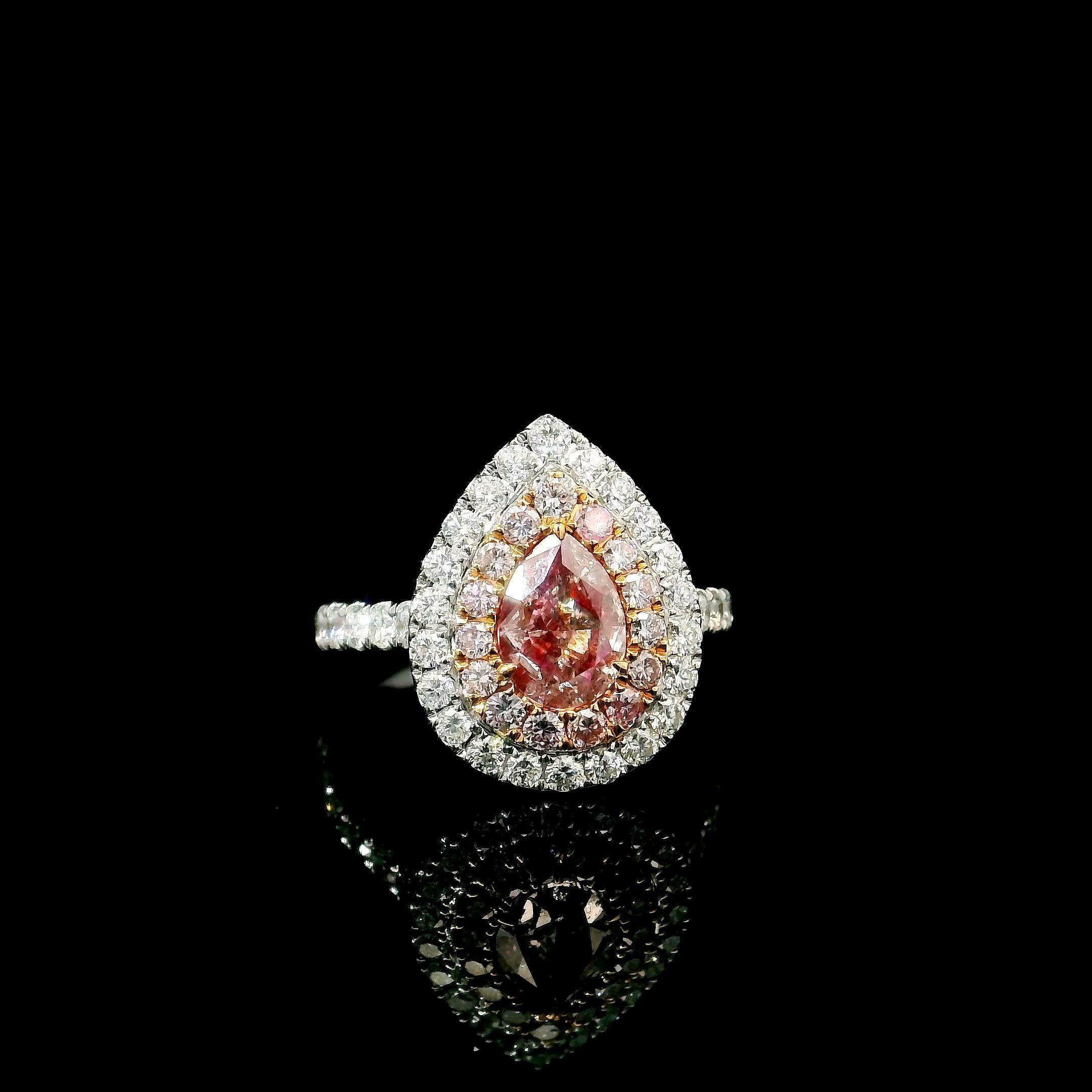 18kt white gold ring with diamonds
  
  Gold colour & karat: White gold 18kt
  Weight: 4.20 grams
  
  Set with-
  Stone type: Diamonds
  Shape: Pear
  Carat: 1.01
  Colour: Fancy Brown Pink
  Clarity: I2
  
  Surrounding Stones: Diamonds
 1) White