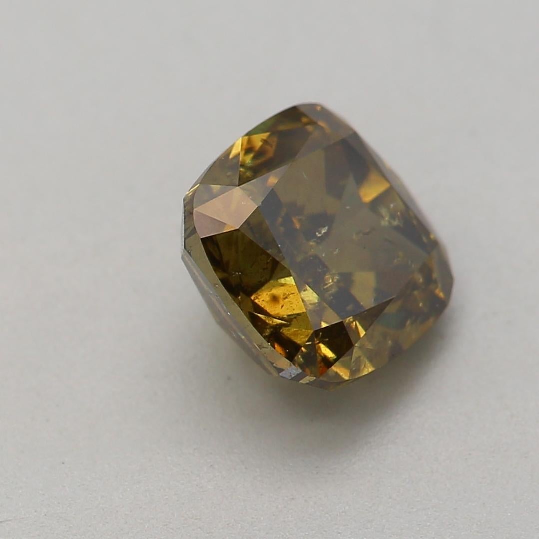 Certificate: GIA
Report Number: 6361724103
Shape And Cut: Cushion
Carat Weight: 1.01 carat
Measurements: 5.62*5.45*3.78 mm
Color Grade: Fancy Dark Greenish Brown

FEATURES OF THE DIAMOND:

Our cushion-shaped diamond, a perfect fusion of classic