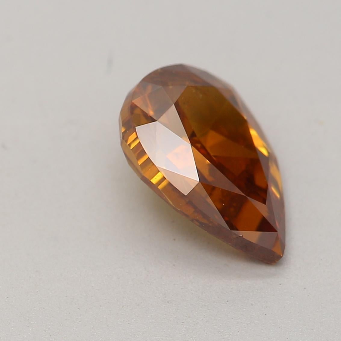 Certificate: GIA
Report Number: 2317198513
Shape And Cut: Pear
Carat Weight: 1.01 carat
Measurements: 8.22 x 5.43 x 3.14 mm
Color Grade:  Fancy Deep Brown Orange

FEATURES OF THE DIAMOND:


This Fancy Deep Brown Orange Diamond is a rare and striking