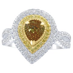 Anillo de compromiso de diamantes pera con certificado GIA de 1,01 quilates y color amarillo parduzco profundo fantasía