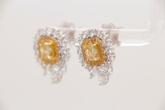 Orecchini a perno con diamante giallo intenso Fancy da 1,01 carati certificati GIA