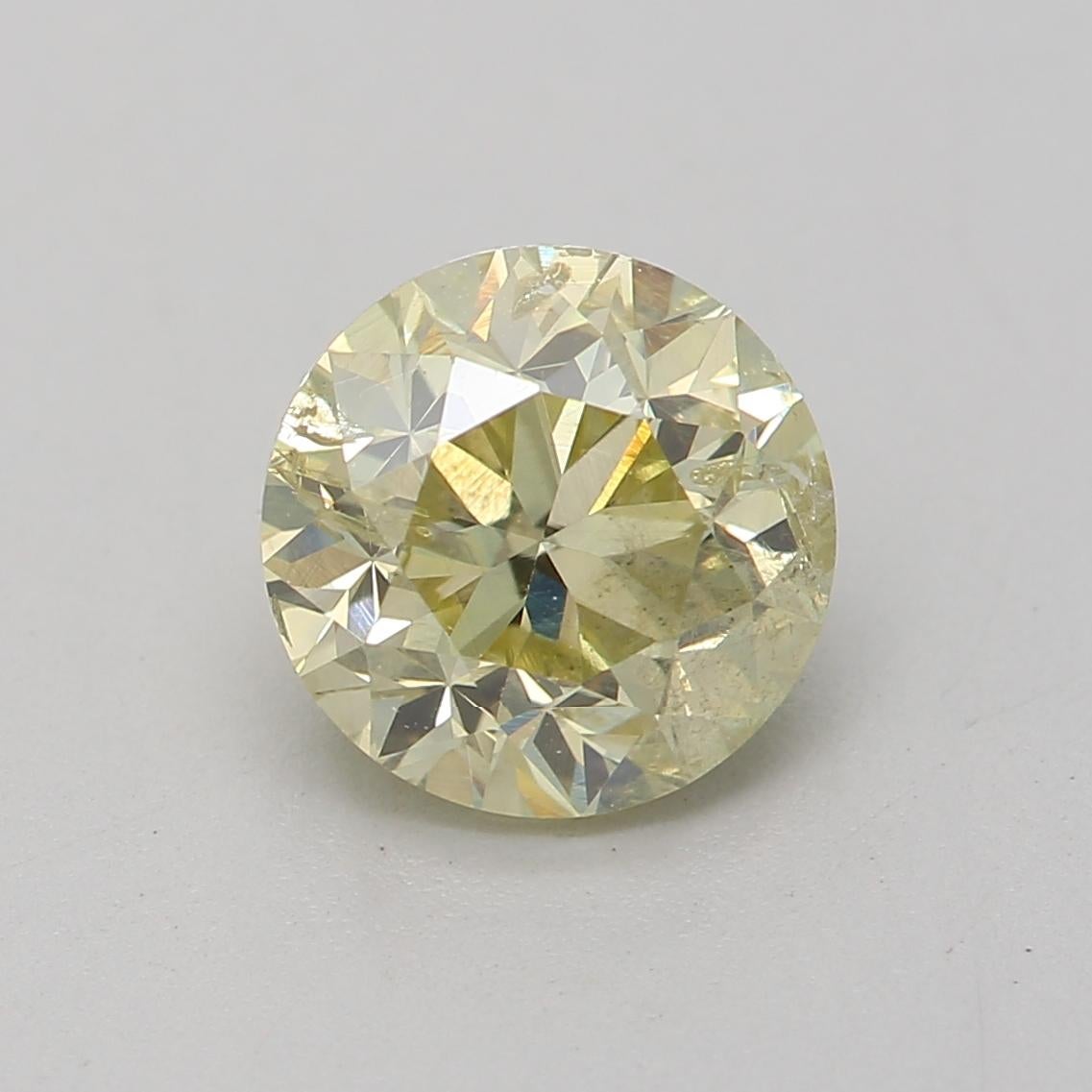 Certificate: GIA 
Report Number: 2436898846
Shape And Cut: Round
Carat Weight: 1.01 carat
Measurements: 6.09 x 6.06 x 4.17 mm
Color Grade: Fancy Light Brownish Greenish Yellow

FEATURES OF THE DIAMOND:

This Fancy Light Brownish Greenish Yellow