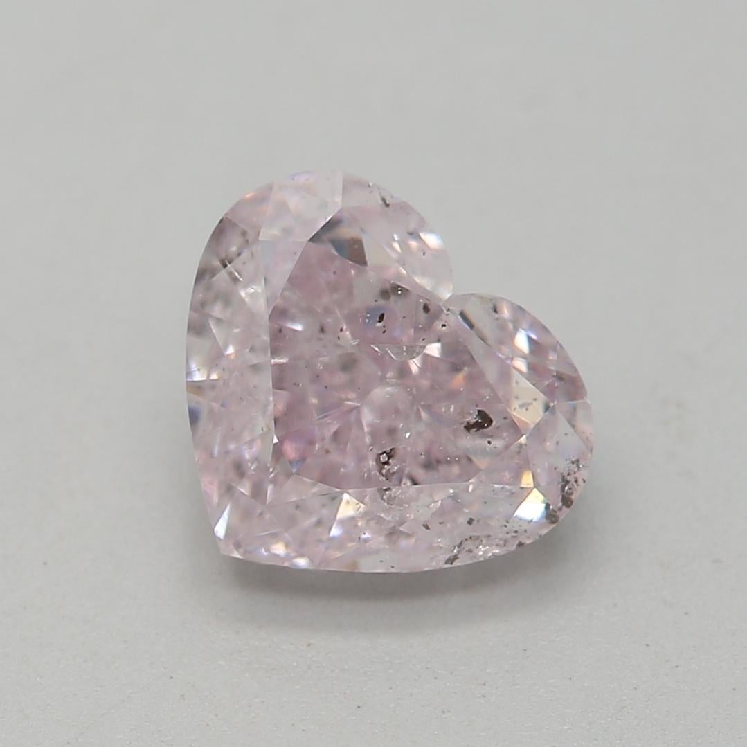 Certificate: GIA 
Report Number: 5416214231
Shape And Cut: Heart
Carat Weight: 1.01 carat
Measurements: 5.63 x 6.63 x 3.56 mm
Color Grade: Fancy Light Purplish Pink

FEATURES OF THE DIAMOND:

This Fancy Light Purplish Pink Diamond is a rare and