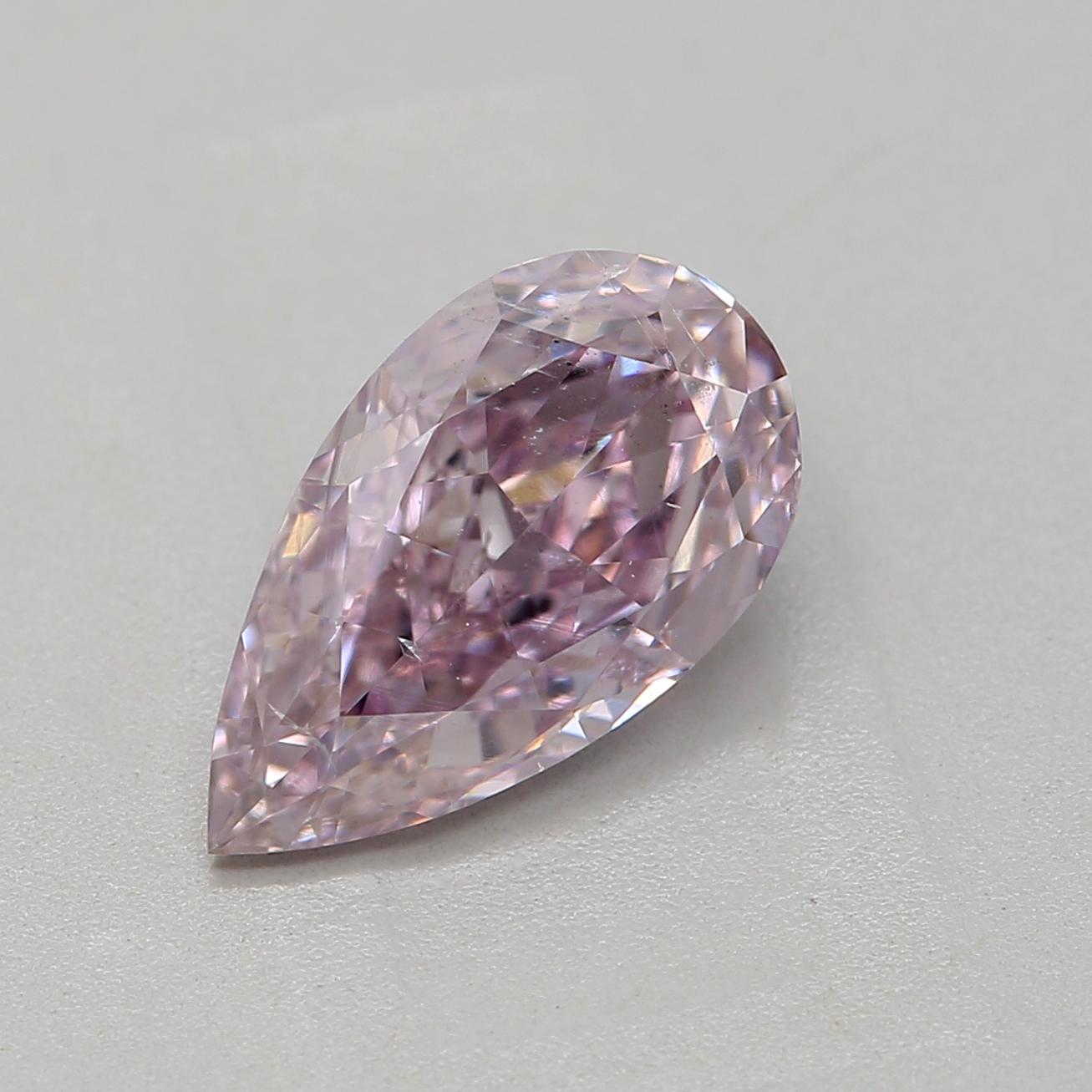 Certificate: GIA 
Report Number: 2486563540
Shape And Cut: Pear
Carat Weight: 1.01 carat
Measurements:  8.92 x 5.06 x 3.19 mm
Color Grade: Fancy Pink Purple

FEATURES OF THE DIAMOND:

This Fancy Pink Purple diamond is a rare and mesmerizing diamond