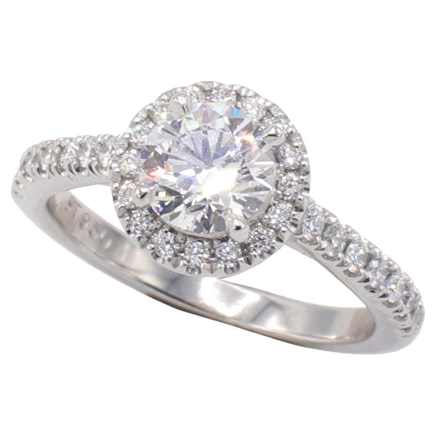 GIA Certified 1.01 Carat H SI1 Round Diamond Halo Platinum Engagement Ring For Sale