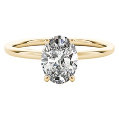 Anello con diamante ovale solitario in oro giallo certificato GIA da 1,01 carati con alone nascosto