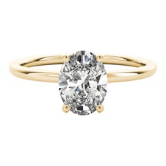 GIA Certified 1.01 Carat Hidden Halo Oval Solitaire Yellow Gold Diamond Ring GIA Certified 1.01 Carat Hidden Halo Oval Solitaire Yellow Gold Diamond Ring