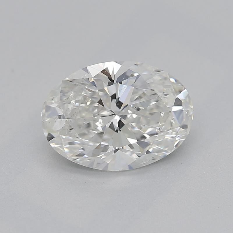 An extraordinary oval diamond ring, showcasing a sparkling 1.01 , H , I1 center stone, commands attention with its elegant design and exceptional craftsmanship. Set in luxurious platinum , the ring features a cathedral basket setting that elevates