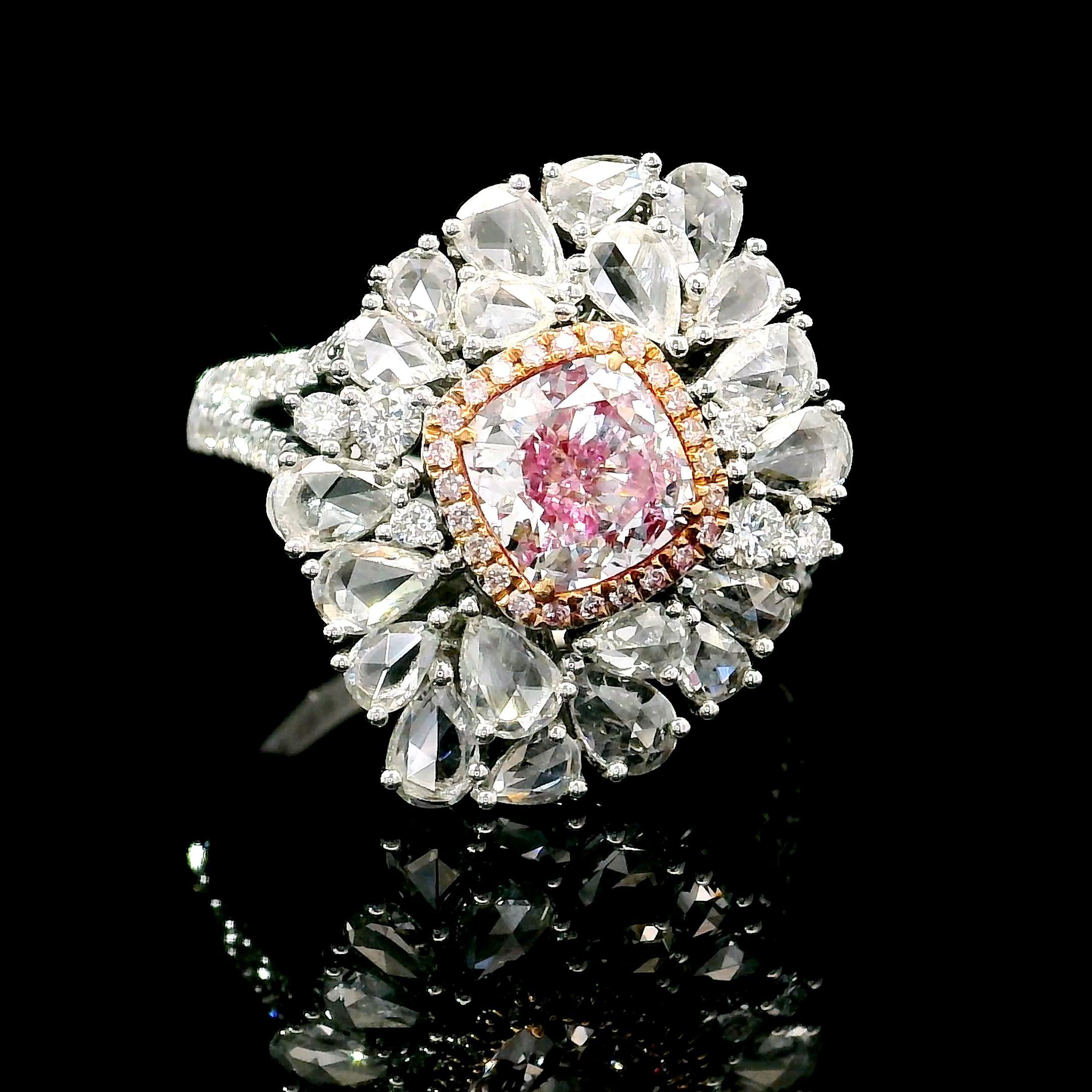 18kt white gold ring with diamonds
  
  Gold colour & karat: White gold 18kt
  Weight: 6.79 grams
  
  Set with-
  Stone type: Diamonds
  Shape: Cushion
  Carat: 1.01
  Colour: Light Pink
  Clarity: VS2
  
  Surrounding Stones: Diamonds
 1) White