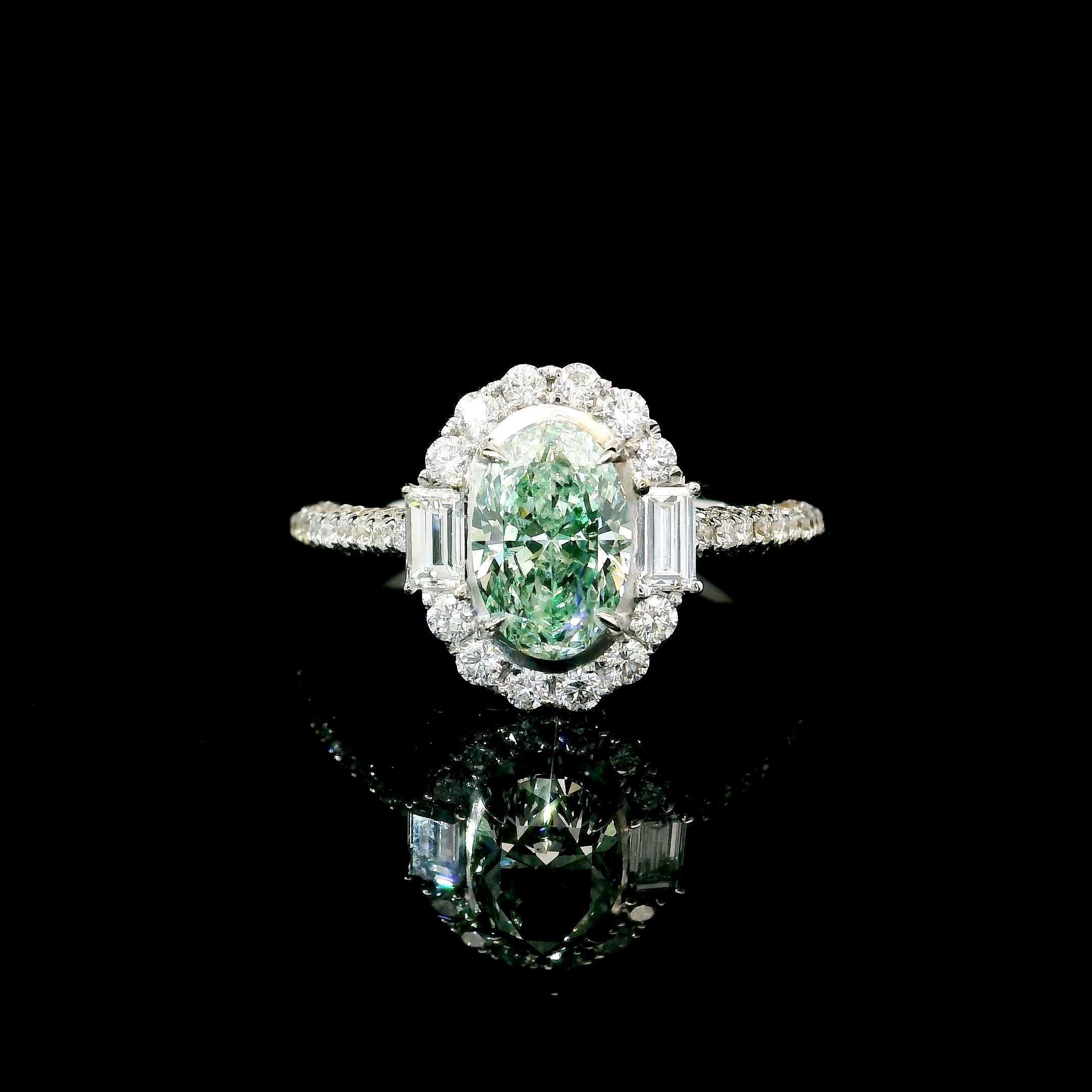 18kt white gold ring with diamonds
  
  Gold colour & karat: White gold 18kt
  Weight: 3.80 grams
  
  Set with-
  Stone type: Diamonds
  Shape: Oval
  Carat: 1.01 ct
  Colour: Light Yellow Green
  Clarity: SI2
  
  Surrounding Stones: Diamonds
 1)