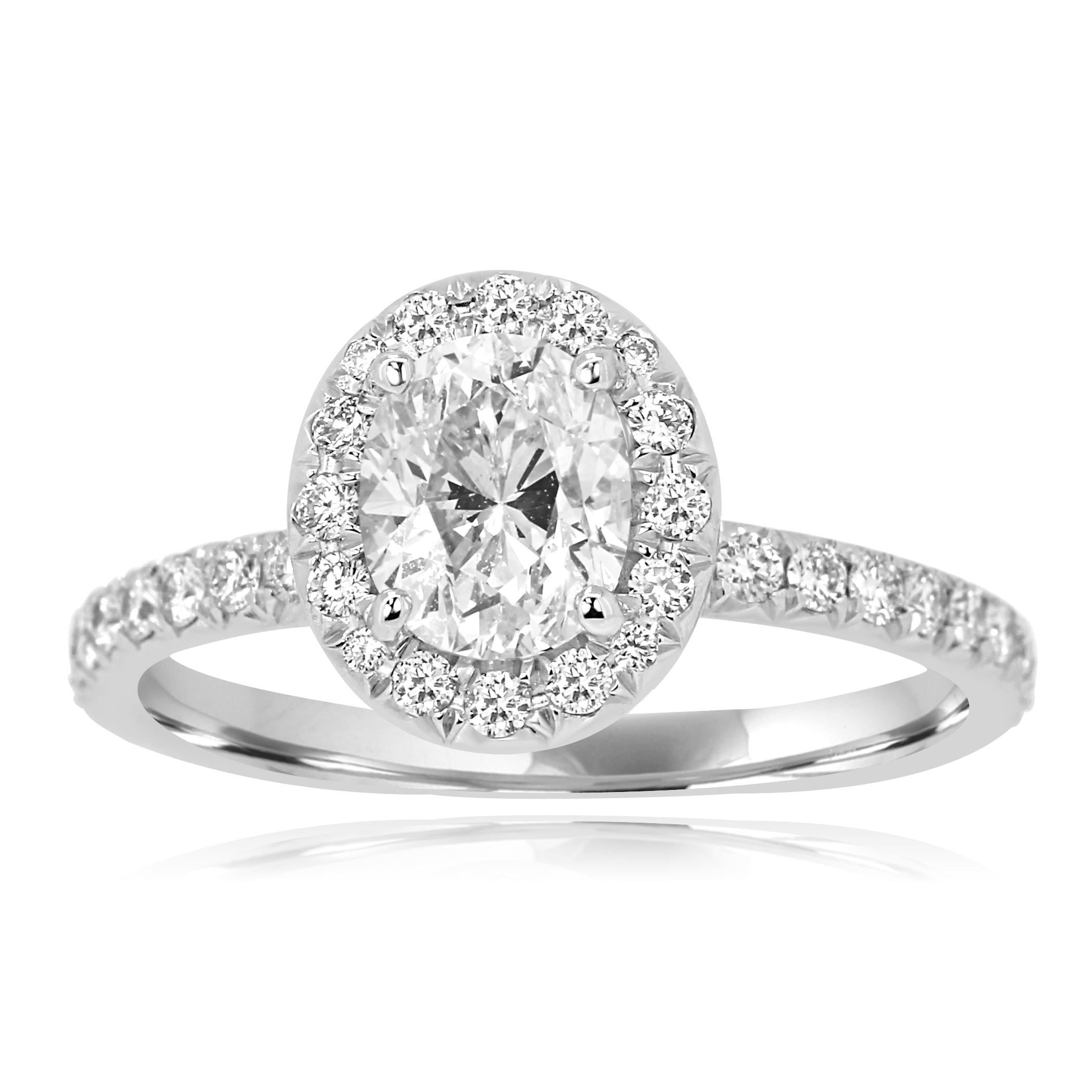 Lovely GIA Certified 1.01 Carat I Color SI2 Clarity Oval Diamond Encircled in a Single Hale of White Round Diamond 0.49 Carat in 18k White Gold and Platinum Engagement Ring.
Wedding Band available separately.

Style available in different price
