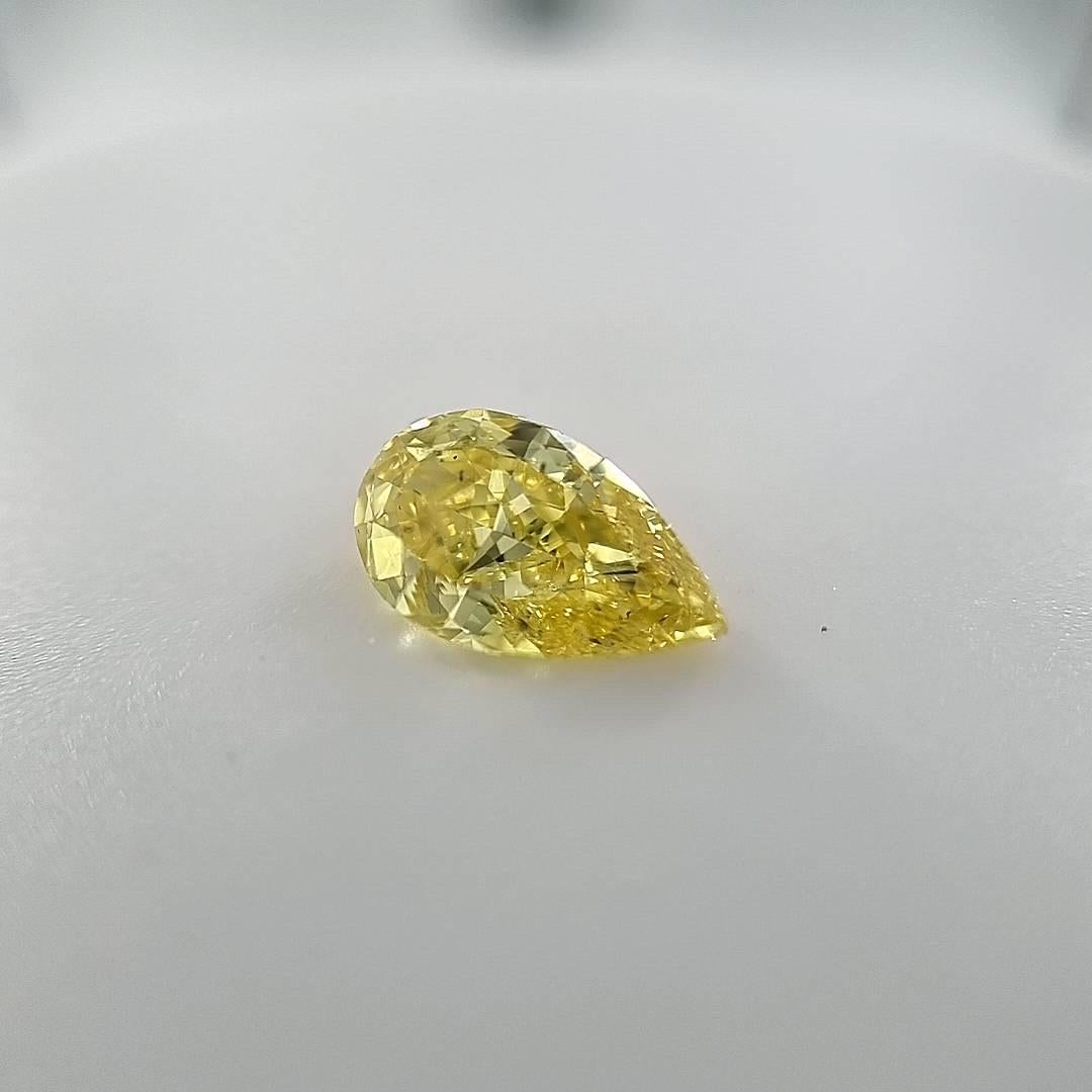 Pear Cut GIA Certified  1.01 Carat Pear Shape Vivid Yellow Zimmi Loose Diamond For Sale