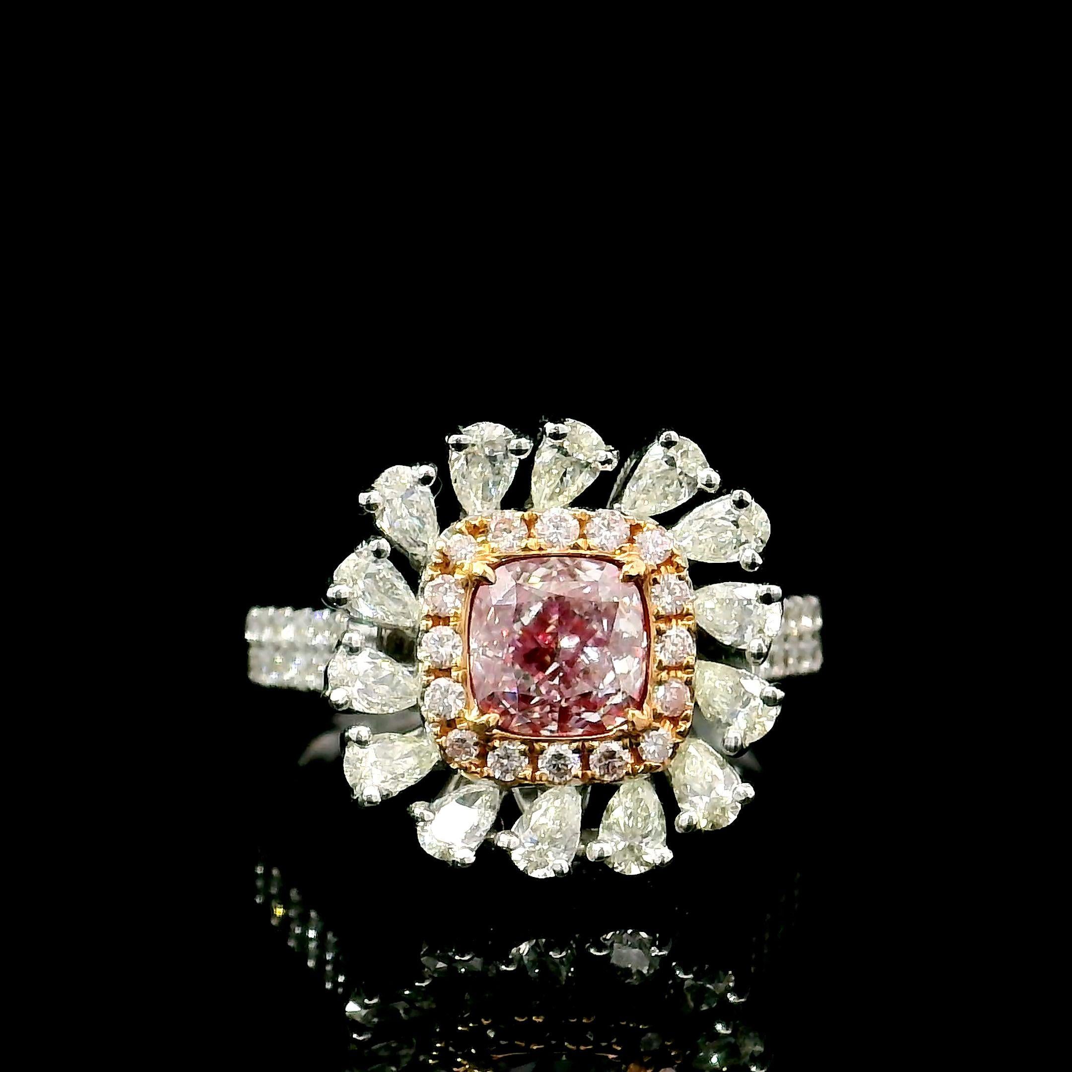 18kt white gold ring with diamonds
  
  Gold colour & karat: White gold 18kt
  Weight: 5.74 grams
  
  Set with-
  Stone type: Diamonds
  Shape: Cushion
  Carat: 1.01 ct
  Colour: Very Light Pink
  Clarity: SI2
  
  Surrounding Stones: Diamonds
 1)