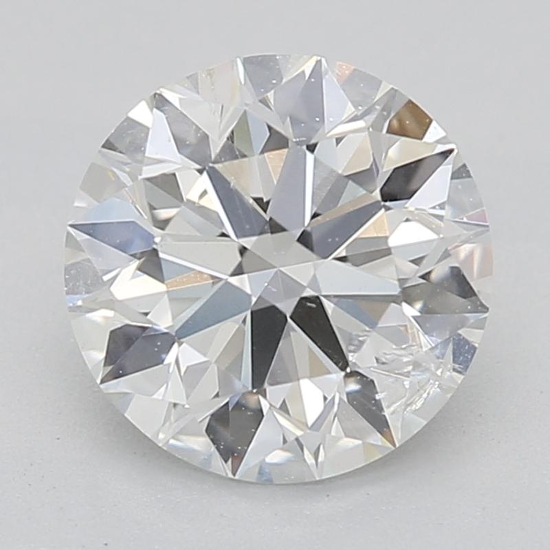 Fabriquée à la main à New York, cette superbe bague en diamant est ornée d'une captivante pierre centrale ronde H SI2 1,01, délicatement sertie pour rehausser son éclat sous tous les angles. Le luxueux bracelet, fabriqué en or blanc, présente une