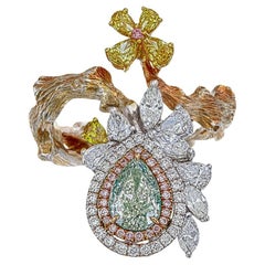 GIA Certified 1.01 Carats Pear Cut Fancy Yellow Diamond Ring in 18K W/G