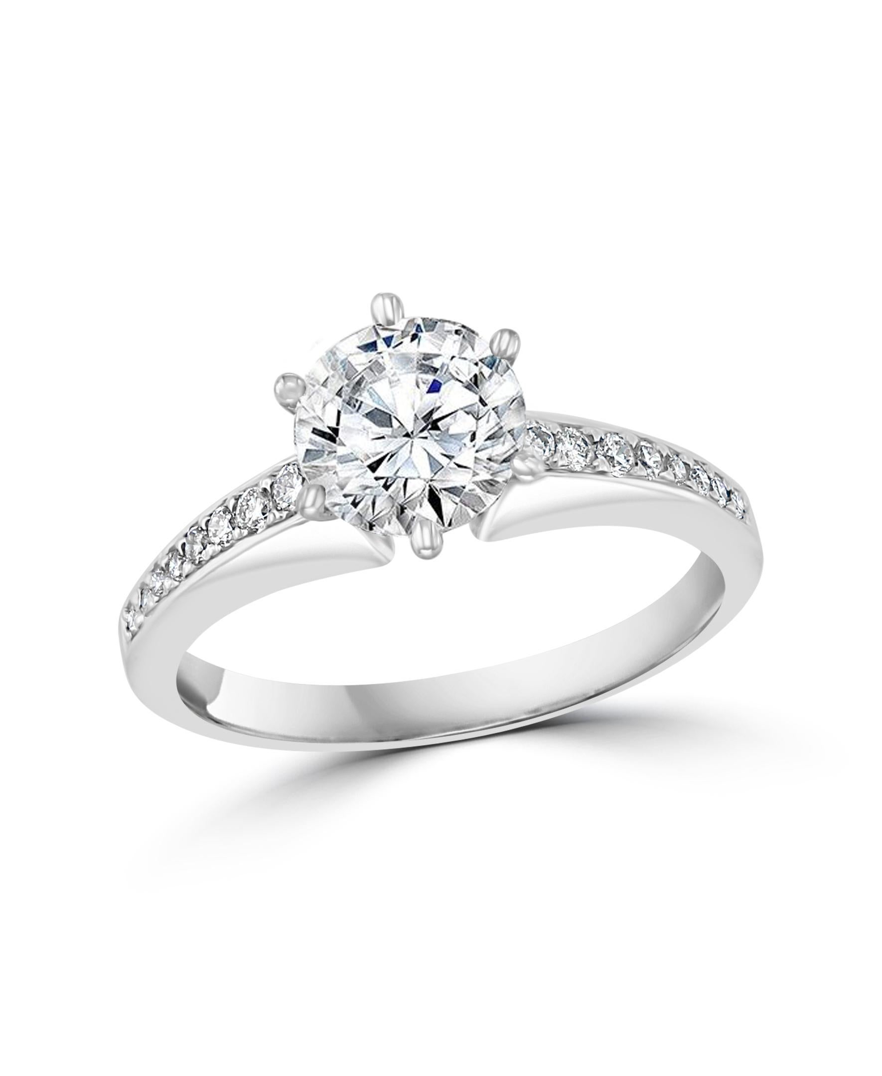 GIA Certified, 1.01 Ct VS2, E  Round Brilliant Diamond Engagement Platinum  Ring
GIA cert # 14199580
Measurements 6.33-640x3.98
Delicate and classic style ring
Platinum 3 Grams
Diamond VS 2 quality and E color.
There are  more brilliant cut diamonds