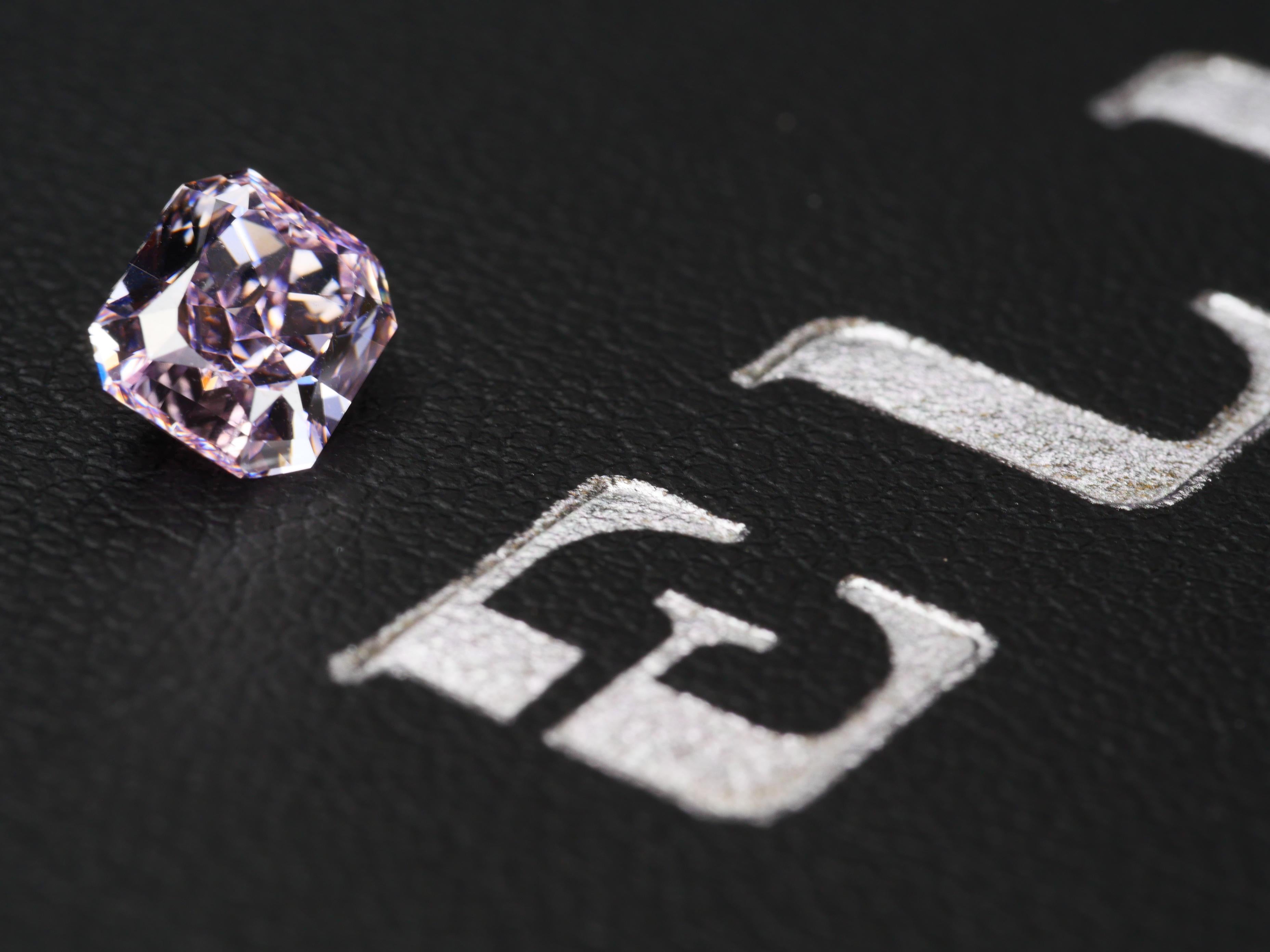 GIA Certified 1.01 Fancy Intense Pink Rectangular Brilliant Cut Diamond For Sale 2