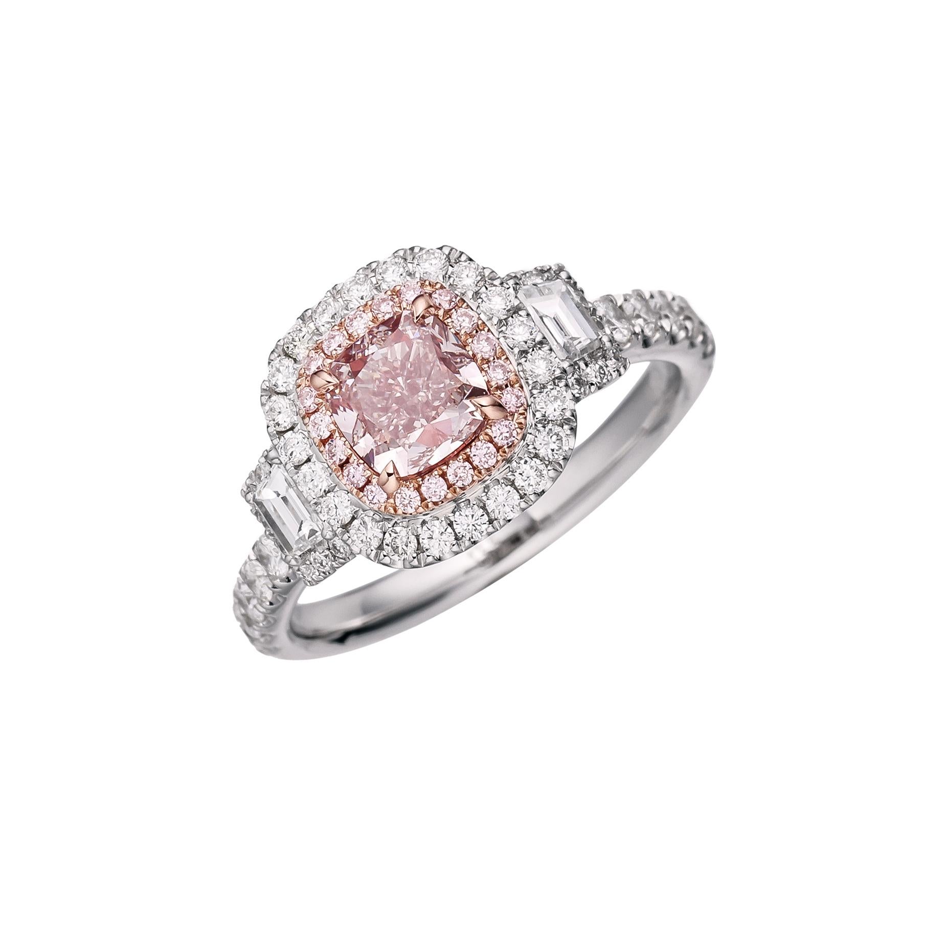 Unveil Elegance: Introducing the Luxurious GIA Certified 1.01ct Fancy Light Pinkish Brown Cushion Cut Natural Diamond Ring, a true embodiment of rare beauty and sophistication. Set upon a resplendent 18kt gold band, this ring is a testament to the