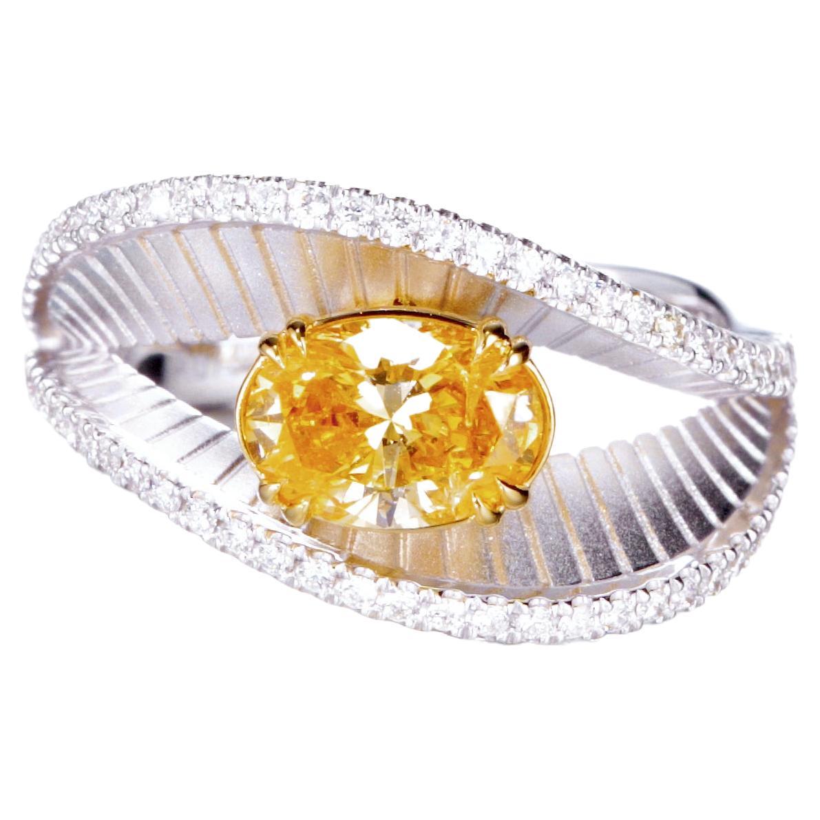 GIA Certified, 1.01 Natural Fancy Intense Yellow-Orange Oval Diamond Ring 18KT  For Sale