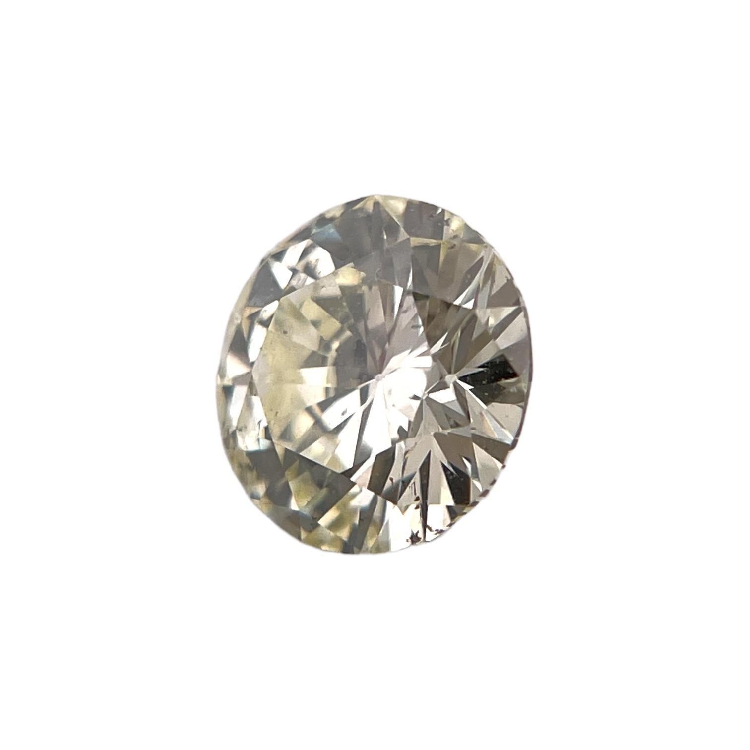 ITEM DESCRIPTION

ID #: NYC57829
Stone Shape: Round
Diamond Weight: 1.01Carat
Fancy Color: Q-R
Cut:	Brilliant
Measurements: 6.57 x 6.64 x 3.70 mm
Symmetry: Good
Polish: Good
Fluorescence: Faint
Certifying Lab: GIA
GIA Certificate #: