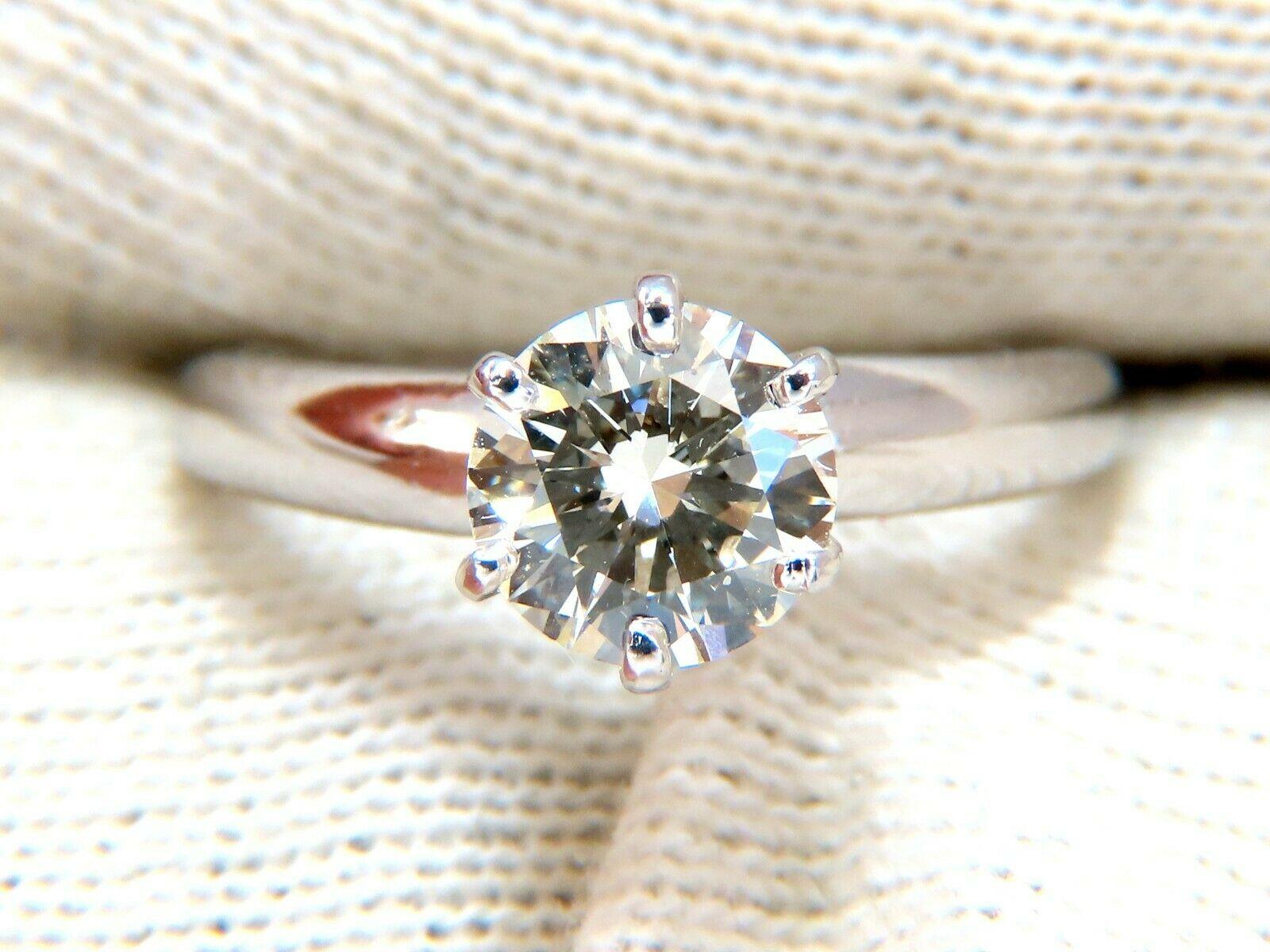 GIA Certified Diamond engagement ring.


Solitaire Classic

GIA Certificate:  2191675696

1.01ct.  Natural Round Cut diamond

N color Vs1 clarity 

(Please see report copy attached)

Platinum

Ring size: 4.25.

We may resize.

Depth of ring: