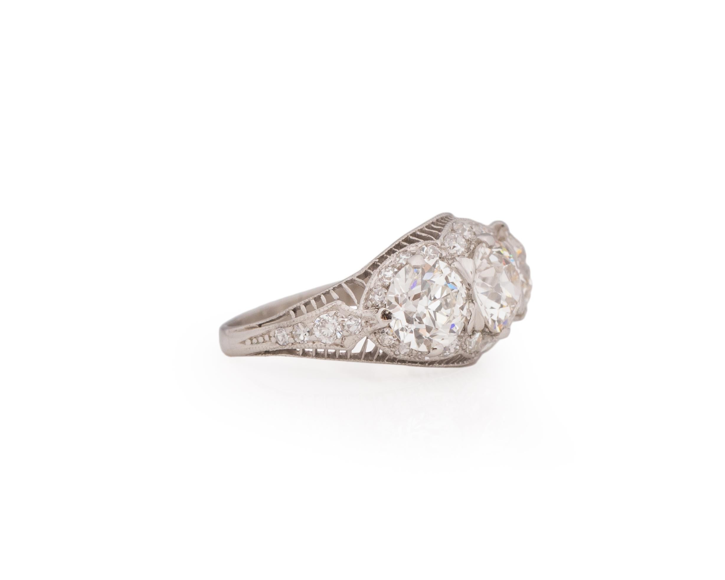 Ring Size: 6.75
Metal Type: Platinum [Hallmarked, and Tested]
Weight: 3.9 grams

This ring includes 3 GIA reports for each of of the 3 center stones.

Diamond 1 (Center Stone)
Diamond Details:
GIA REPORT #: 1226484595
Weight: 1.02ct
Cut: Old
