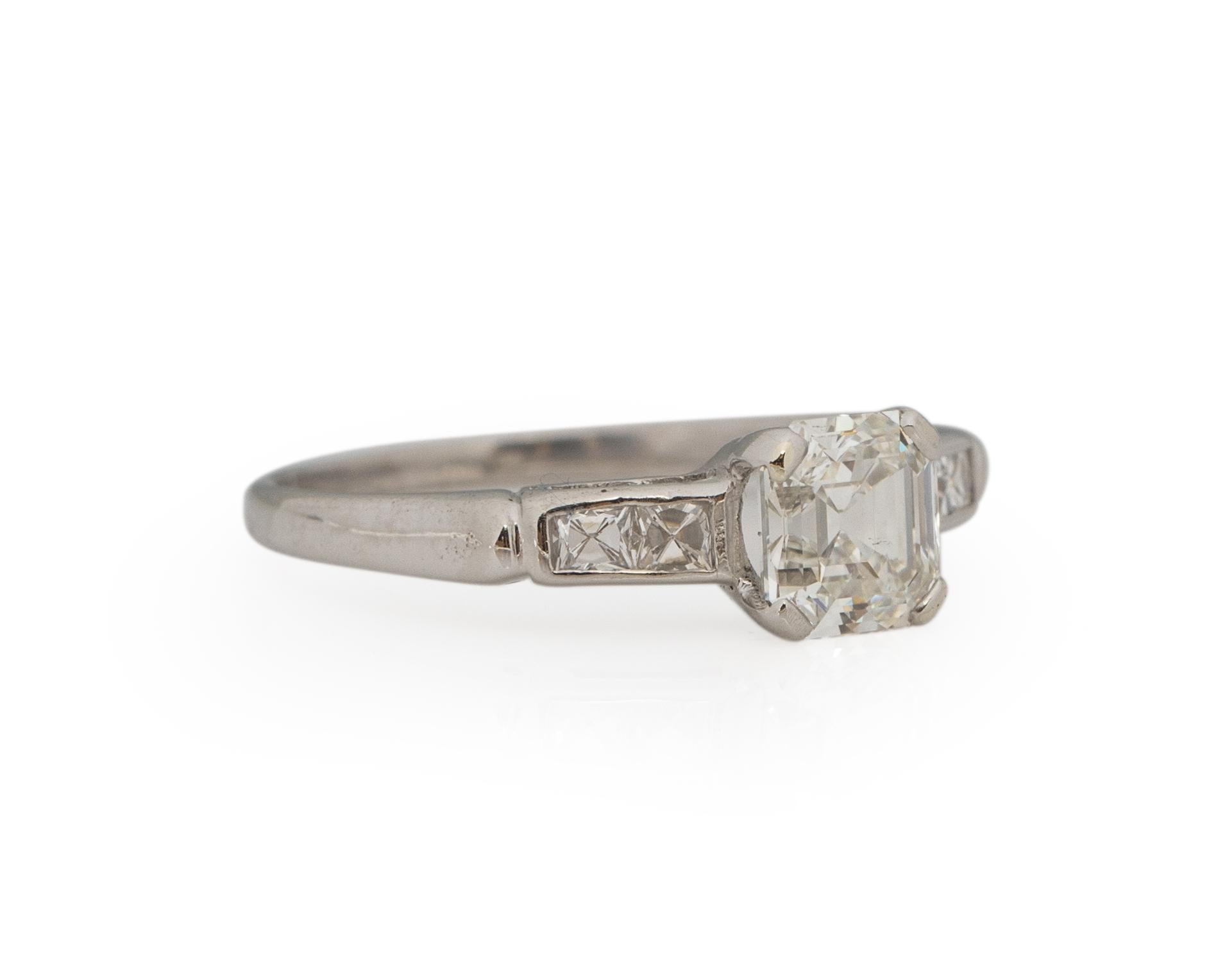 Ring Size: 6.5
Metal Type: Platinum [Hallmarked, and Tested]
Weight: 2.9 grams

Center Diamond Details:
GIA REPORT #:
Weight: 1.02ct
Cut: Vintage Asscher Cut
Color: I
Clarity: VS2
Measurements: 5.86mm x 5.50mm x 3.80mm

Side Stone Details:
Weight: