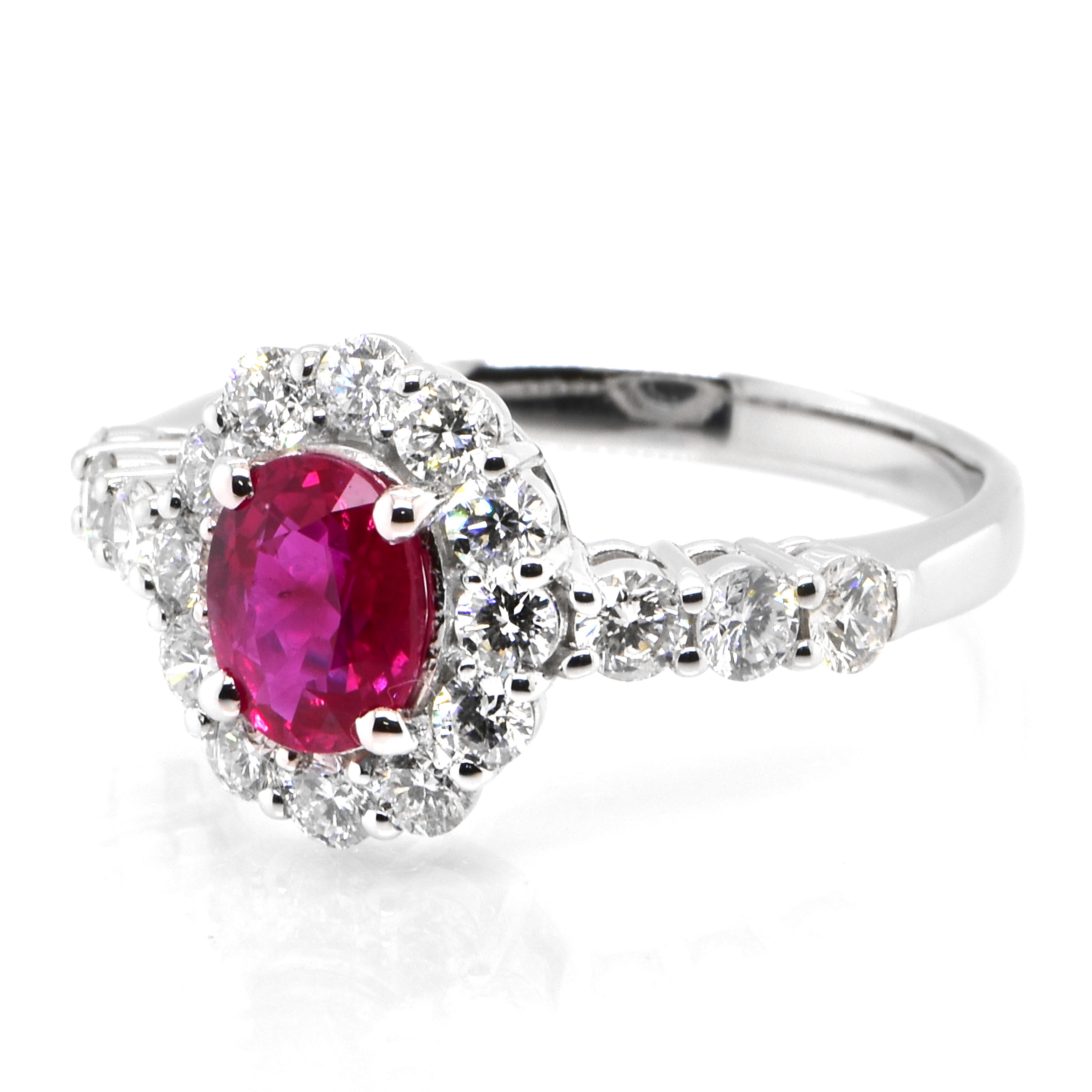 A beautiful Ring set in Platinum featuring a GIA Certified 1.02 Carat Natural Burmese Ruby and 0.89 Carat Diamonds. Rubies are referred to as 
