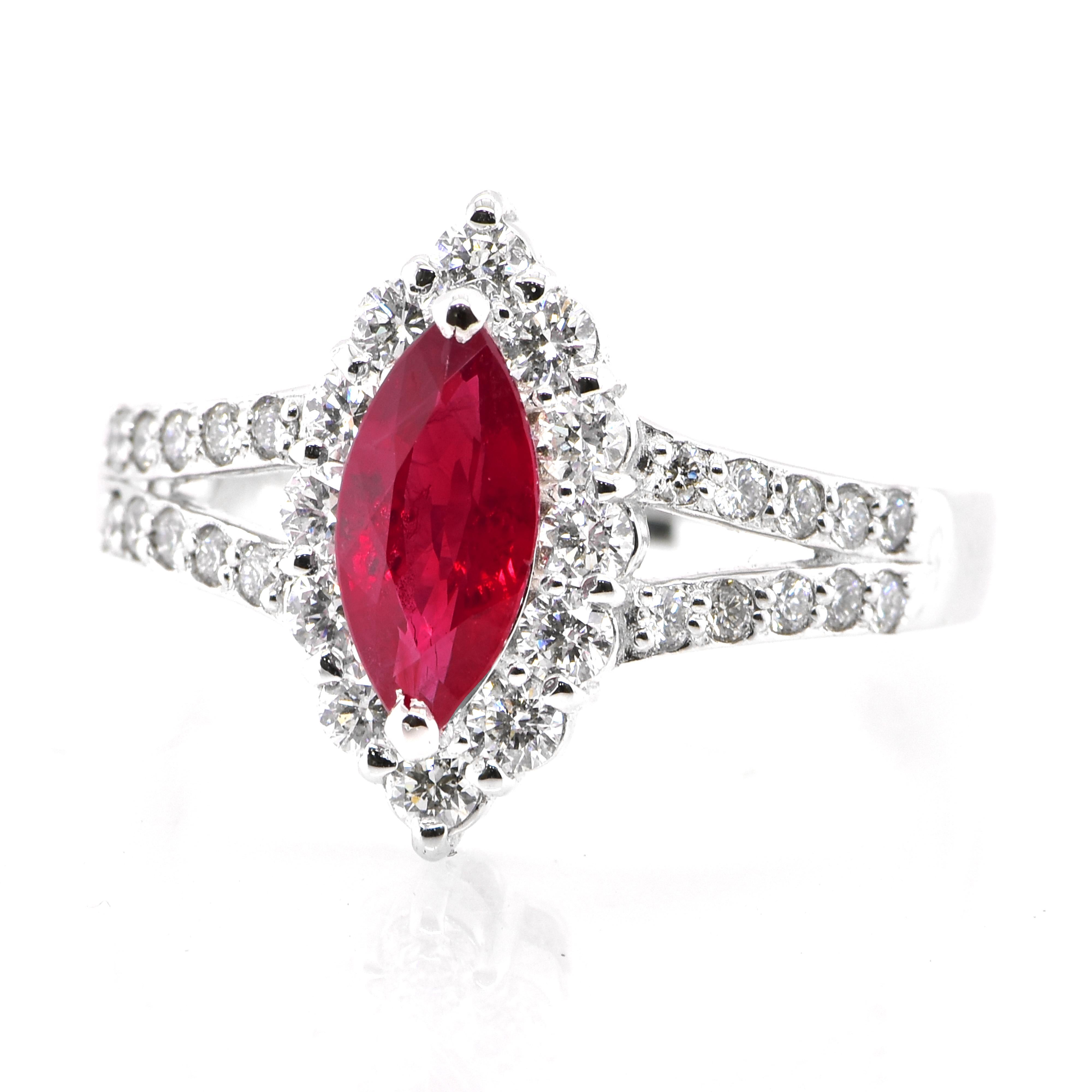 A beautiful GIA Certified 1.02 Carat Burmese Origin, Pigeon's Blood Ruby and 0.62 Carat Diamonds set in Platinum. Rubies are referred to as 