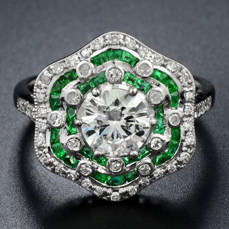 Art Deco Style Ring with GIA Certified Diamond 1.02 Carat E color VVS2 and surrounding with Fine Cut Emerald 0.82 Carat and Single Cut Diamond 48 pcs. 0.30 Carat.
This ring was made in 18K White Gold.
Currently, size US. 7

* If you would like to