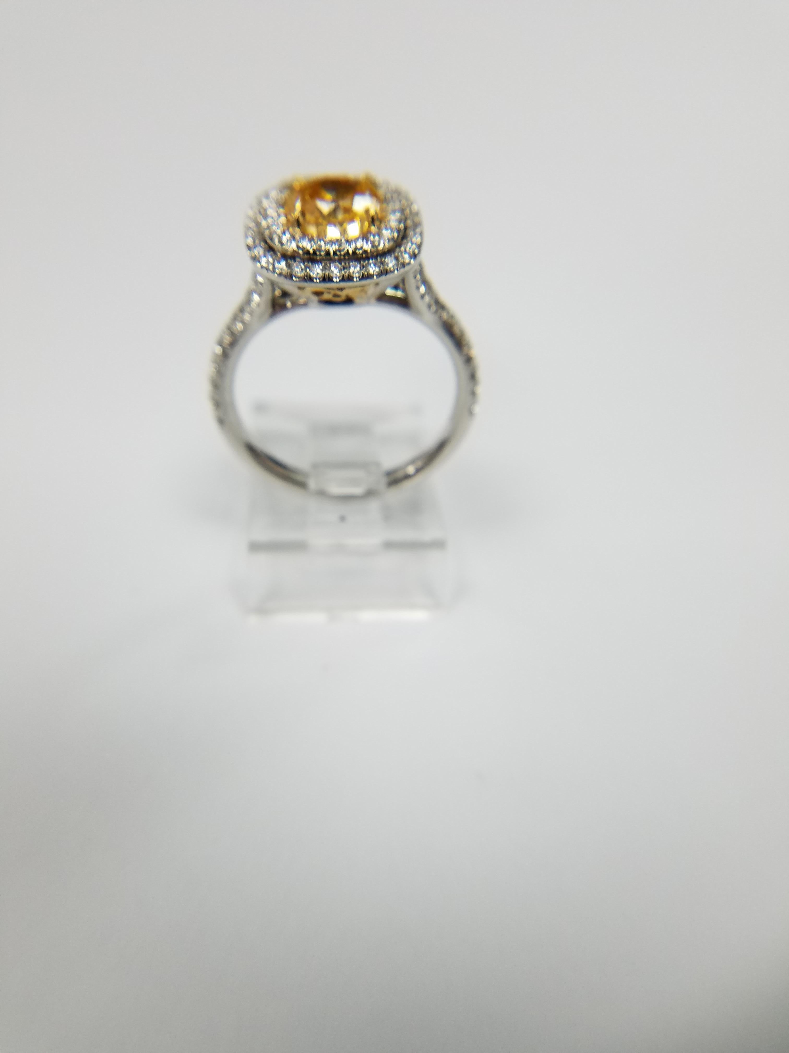 Round Cut GIA Certified 1.02 Carat Diamond Natural Fancy Intense Yellow Orange Color Ring For Sale